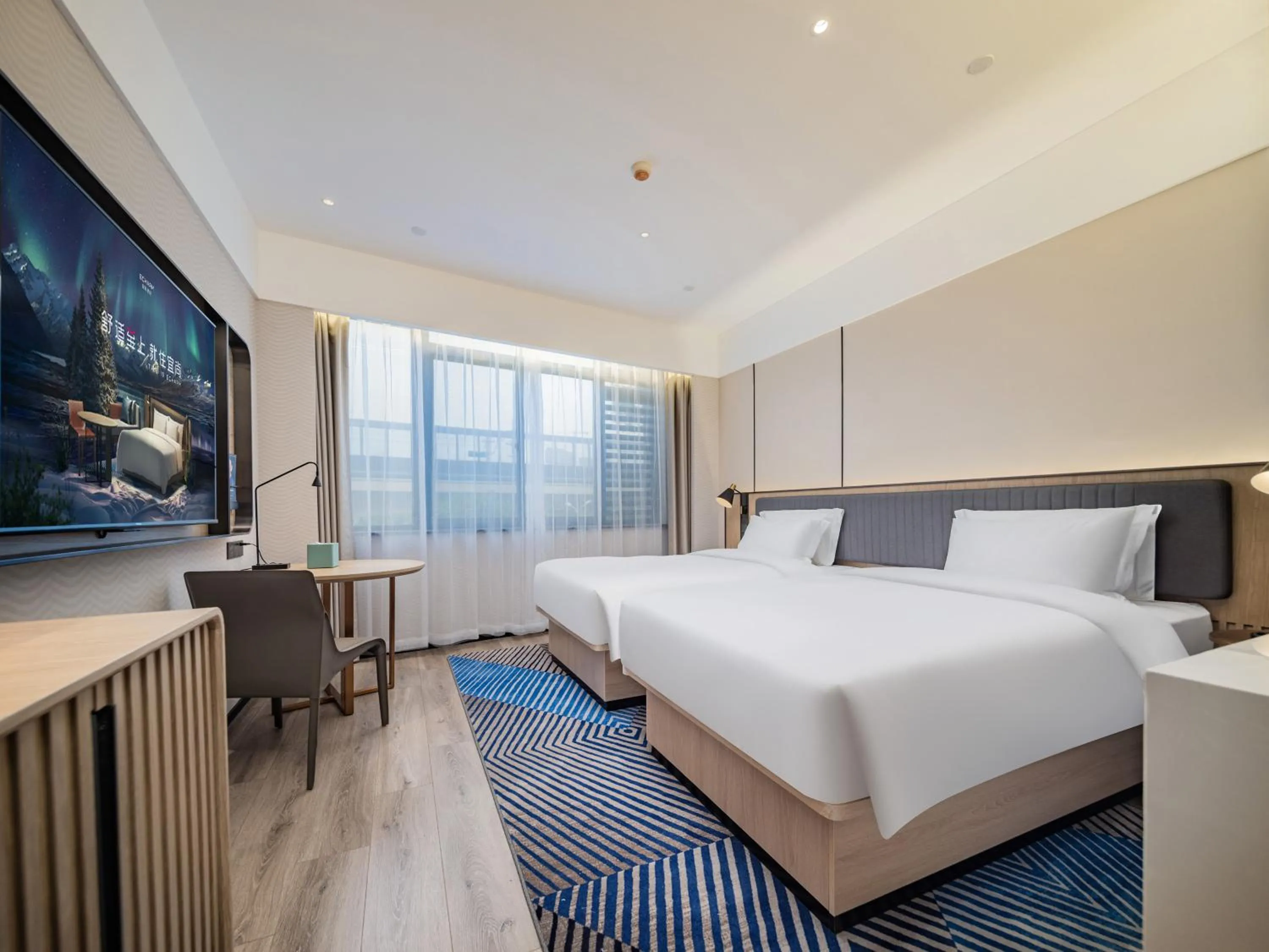 Bed in Echarm Hotel Xi'an Chanba International Exhibition Center