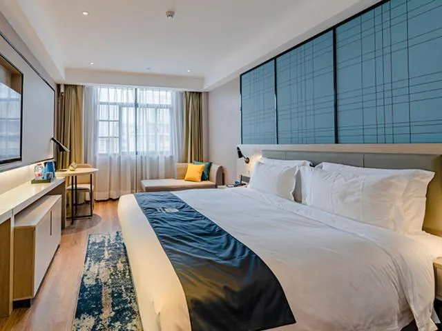 Bed in Echarm Hotel Yunmeng Mengze Lake Branch