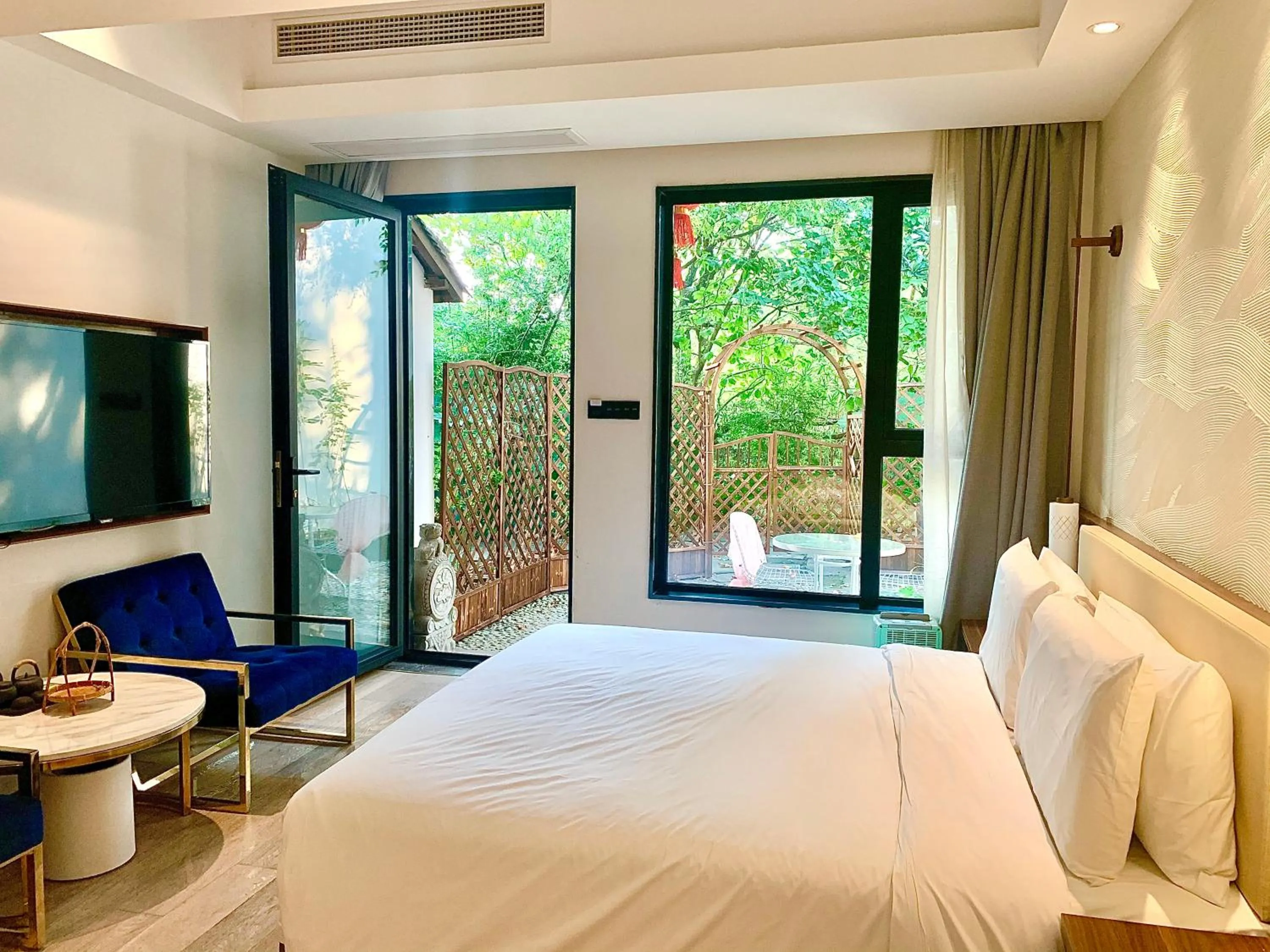 Seating area, Bed in Xishang Yunjian Holiday Hotel