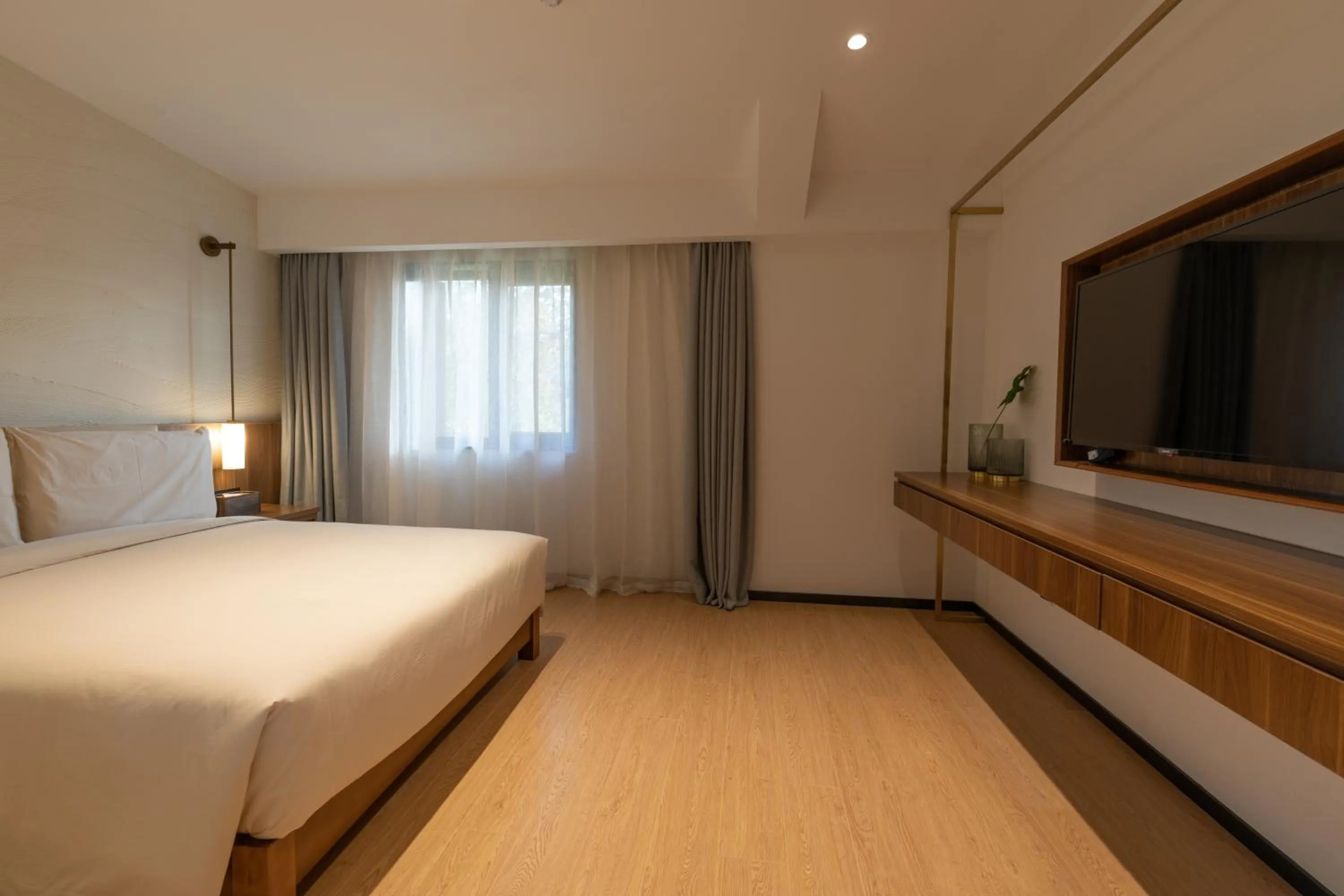 Bed in Xishang Yunjian Holiday Hotel