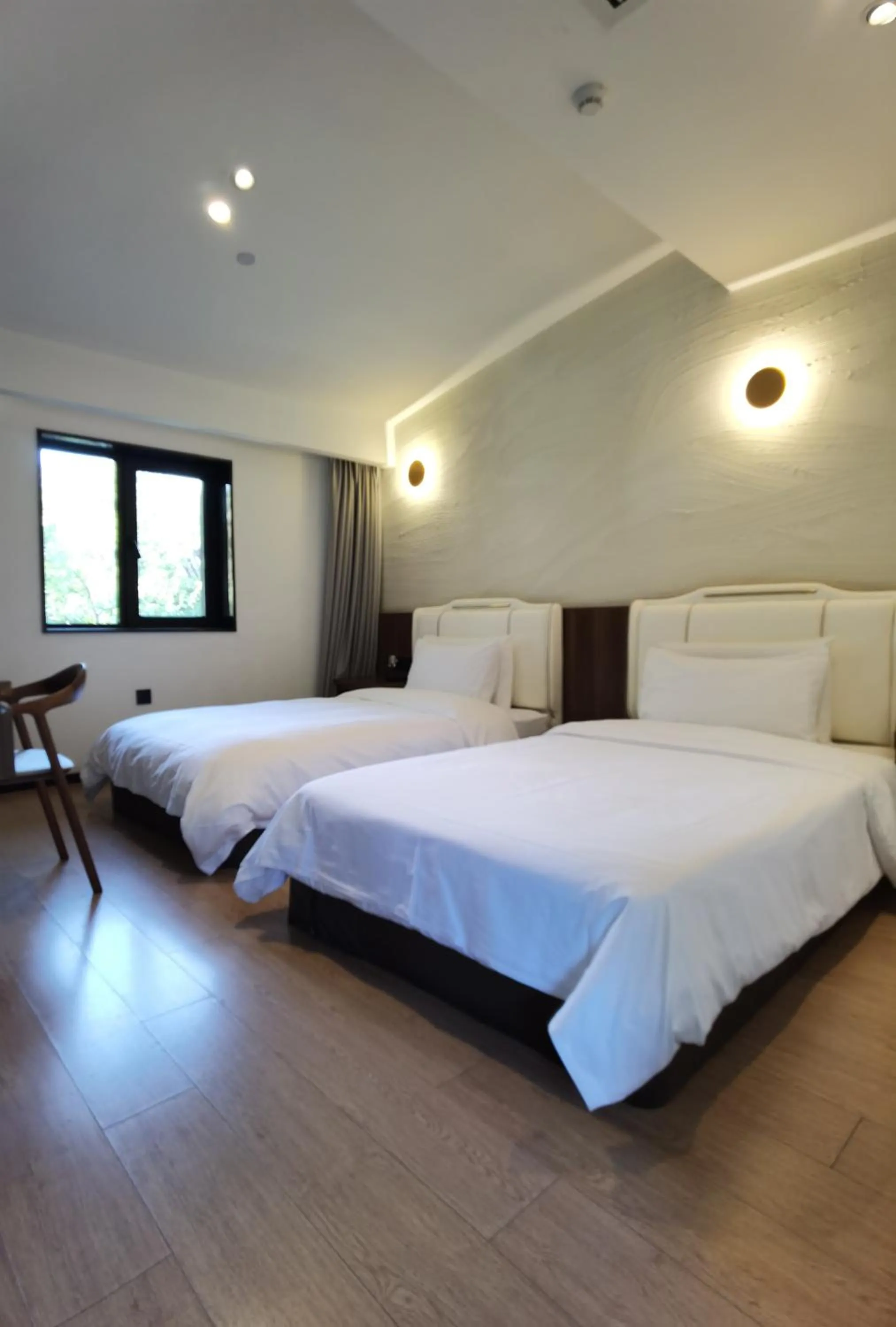 Bed in Xishang Yunjian Holiday Hotel
