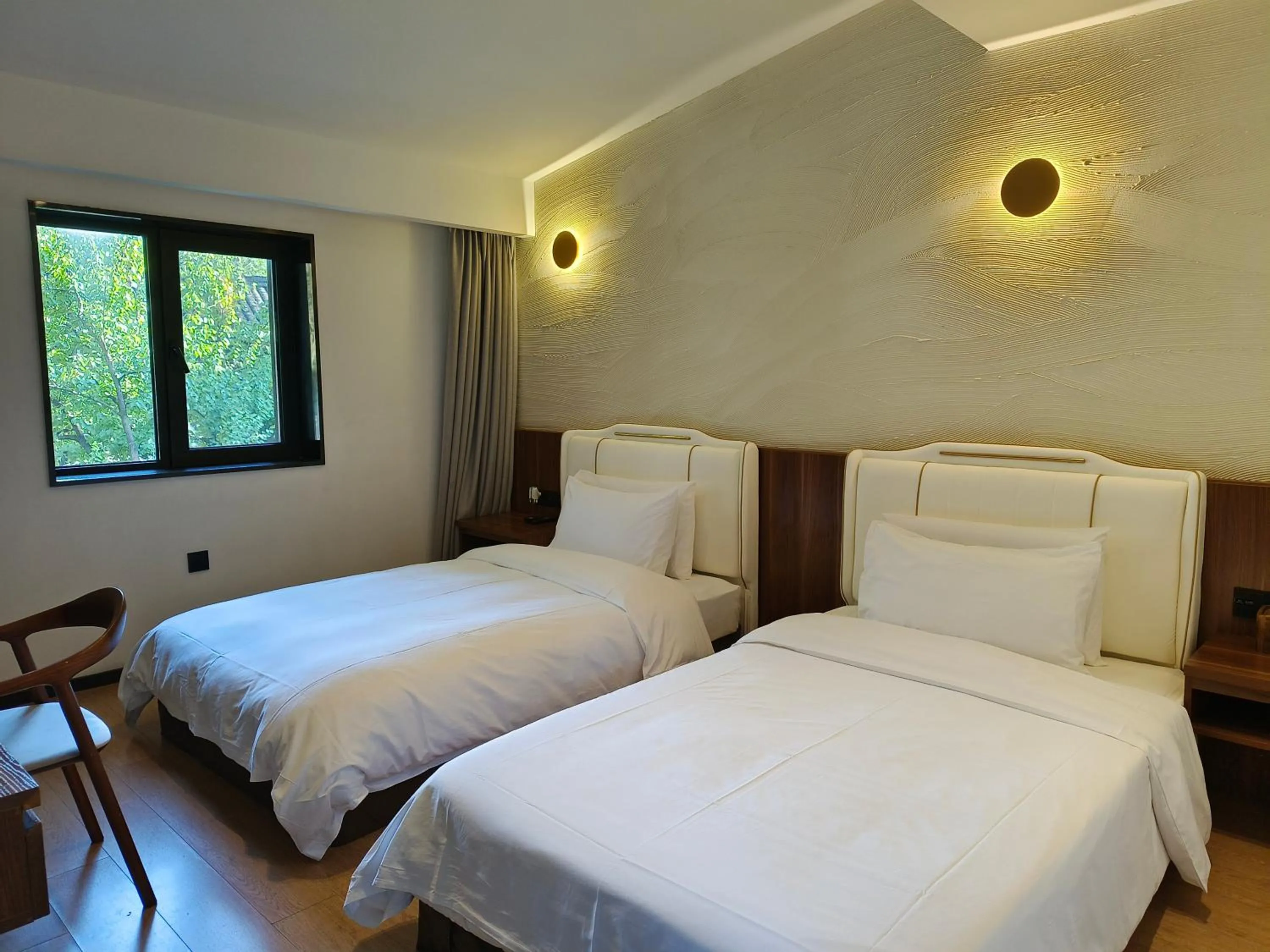 Bed in Xishang Yunjian Holiday Hotel