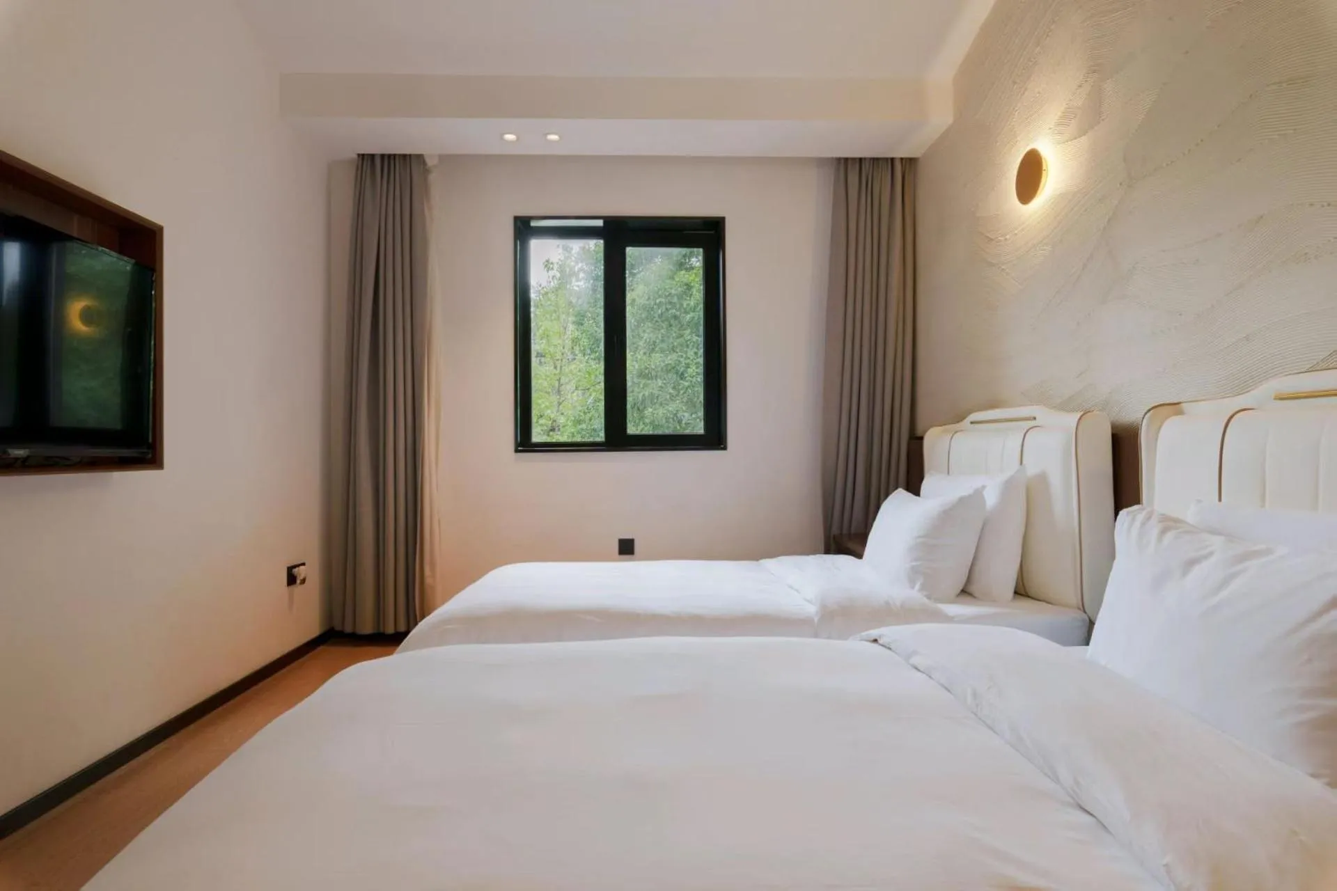 Bed in Xishang Yunjian Holiday Hotel