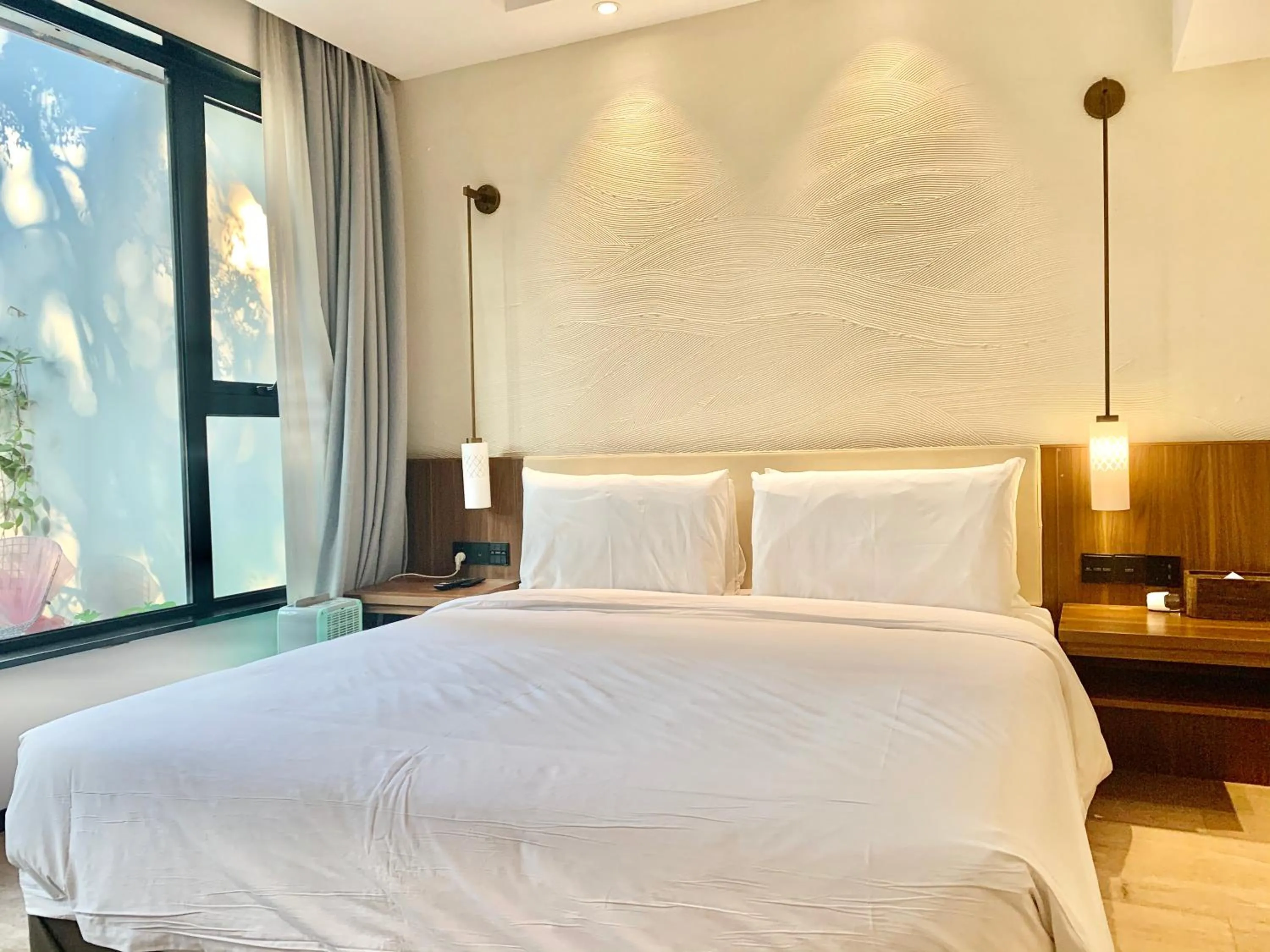 Bed in Xishang Yunjian Holiday Hotel