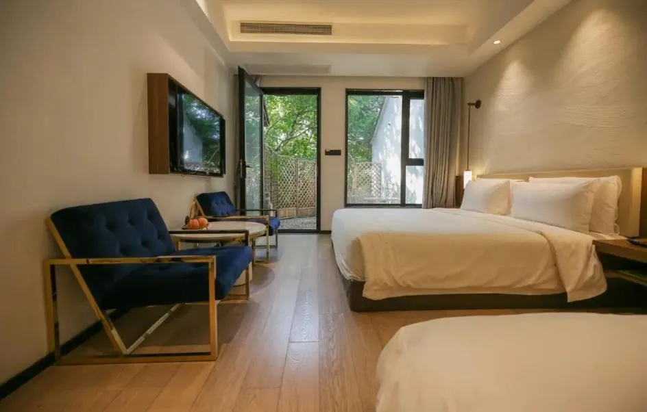 Bed in Xishang Yunjian Holiday Hotel