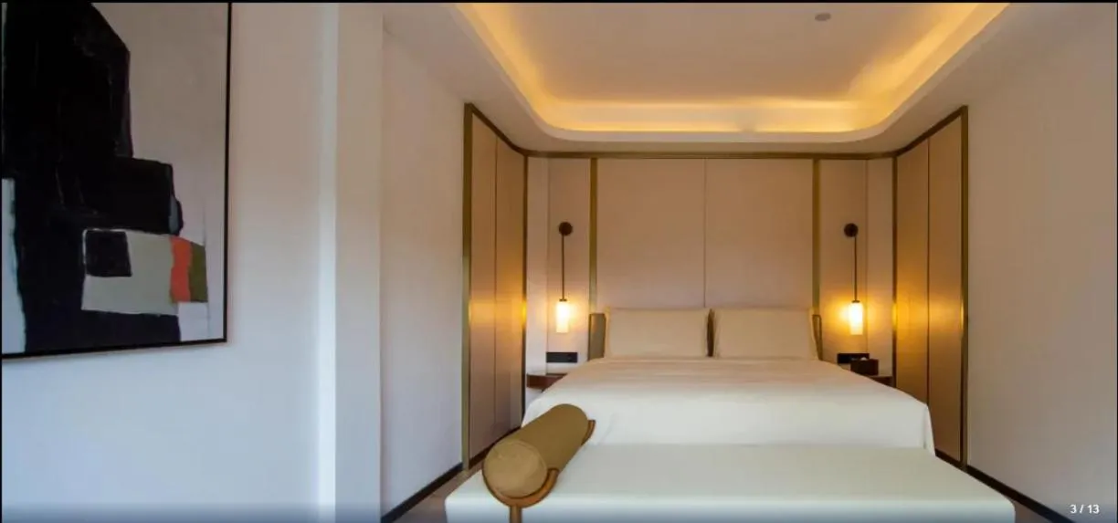 Bed in Xishang Yunjian Holiday Hotel