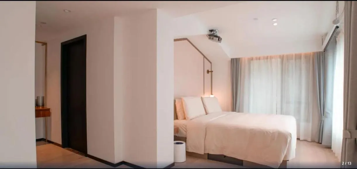 Bed in Xishang Yunjian Holiday Hotel