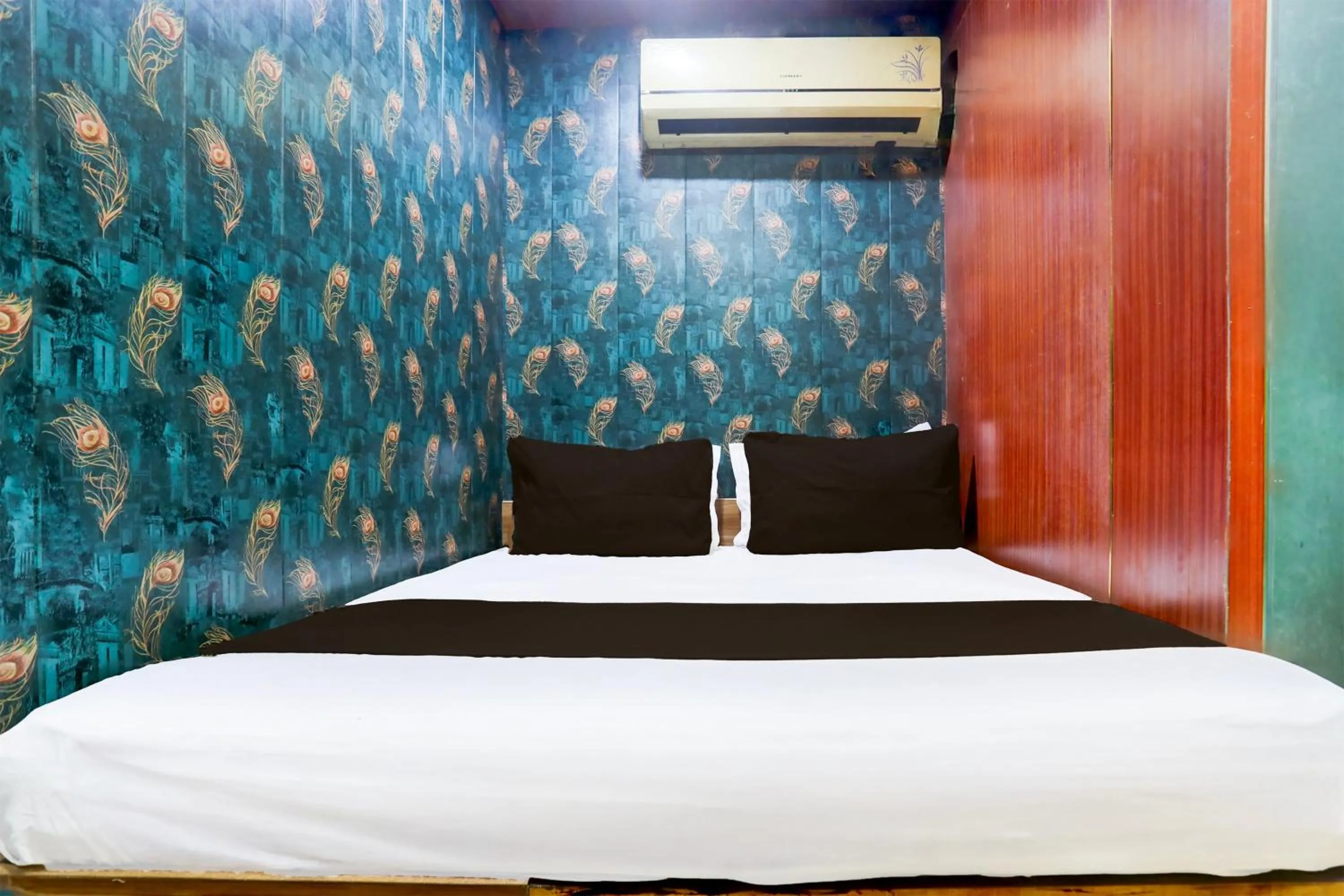 Bedroom in Hotel O A K Residency