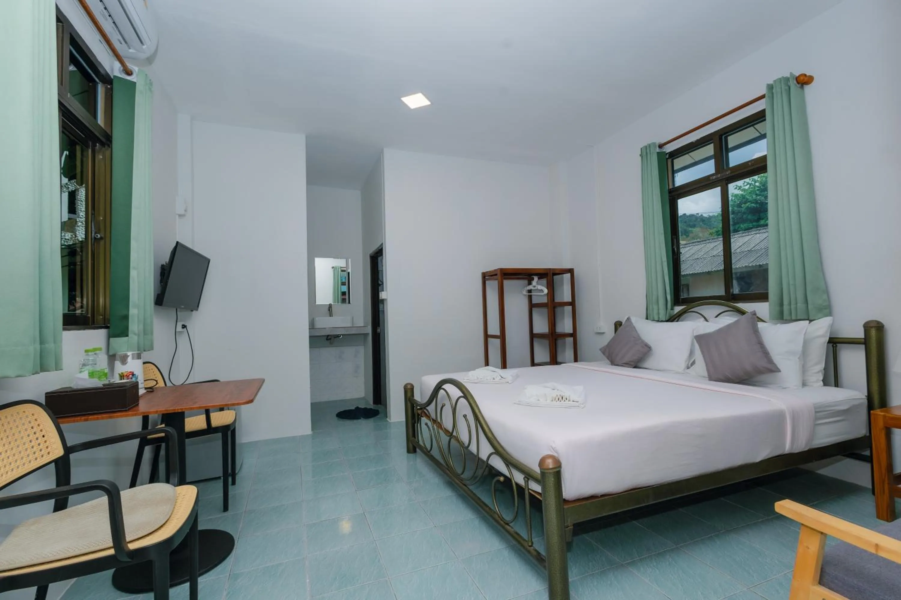 Photo of the whole room, Bed in Charung by The Sea