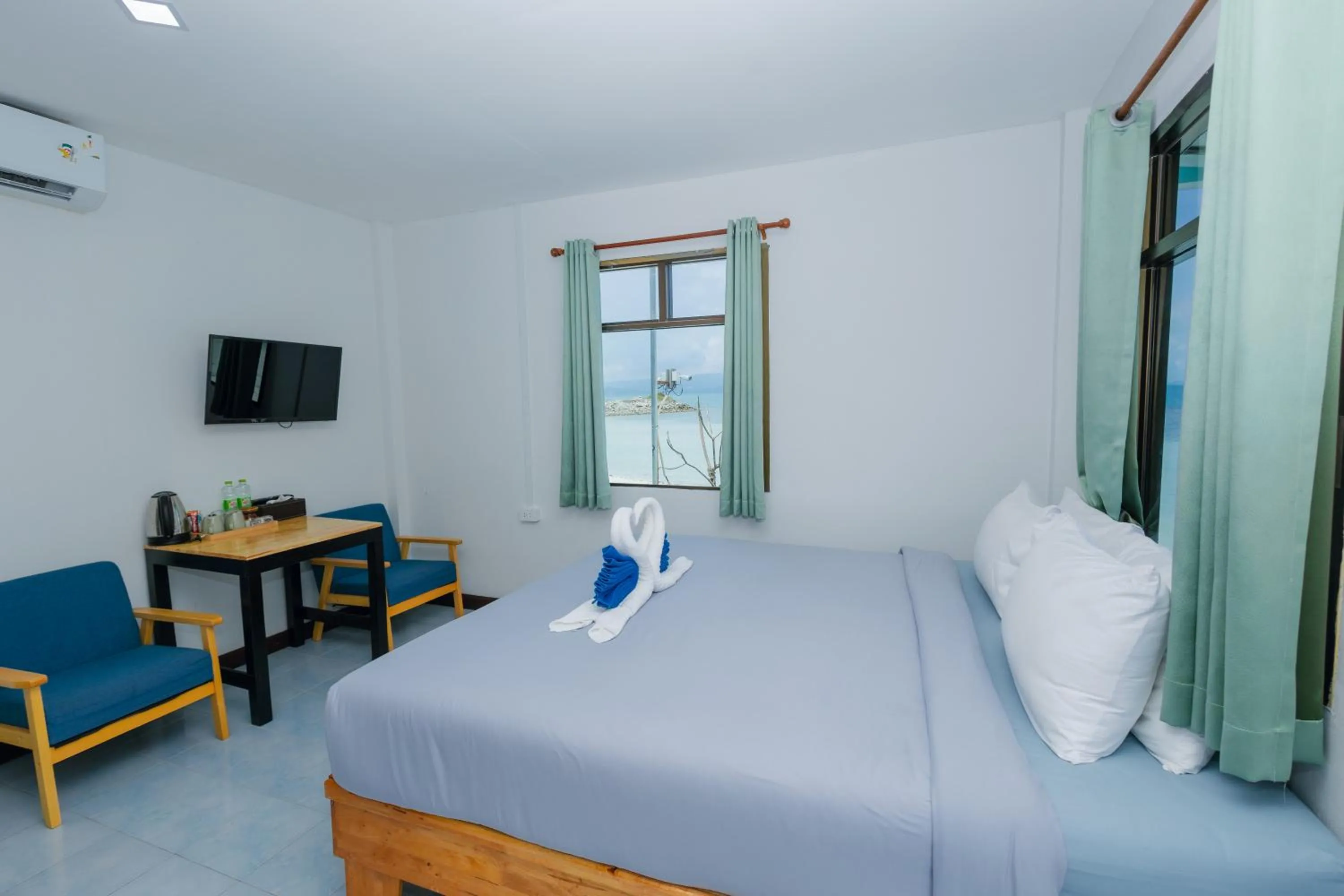 Photo of the whole room, Bed in Charung by The Sea