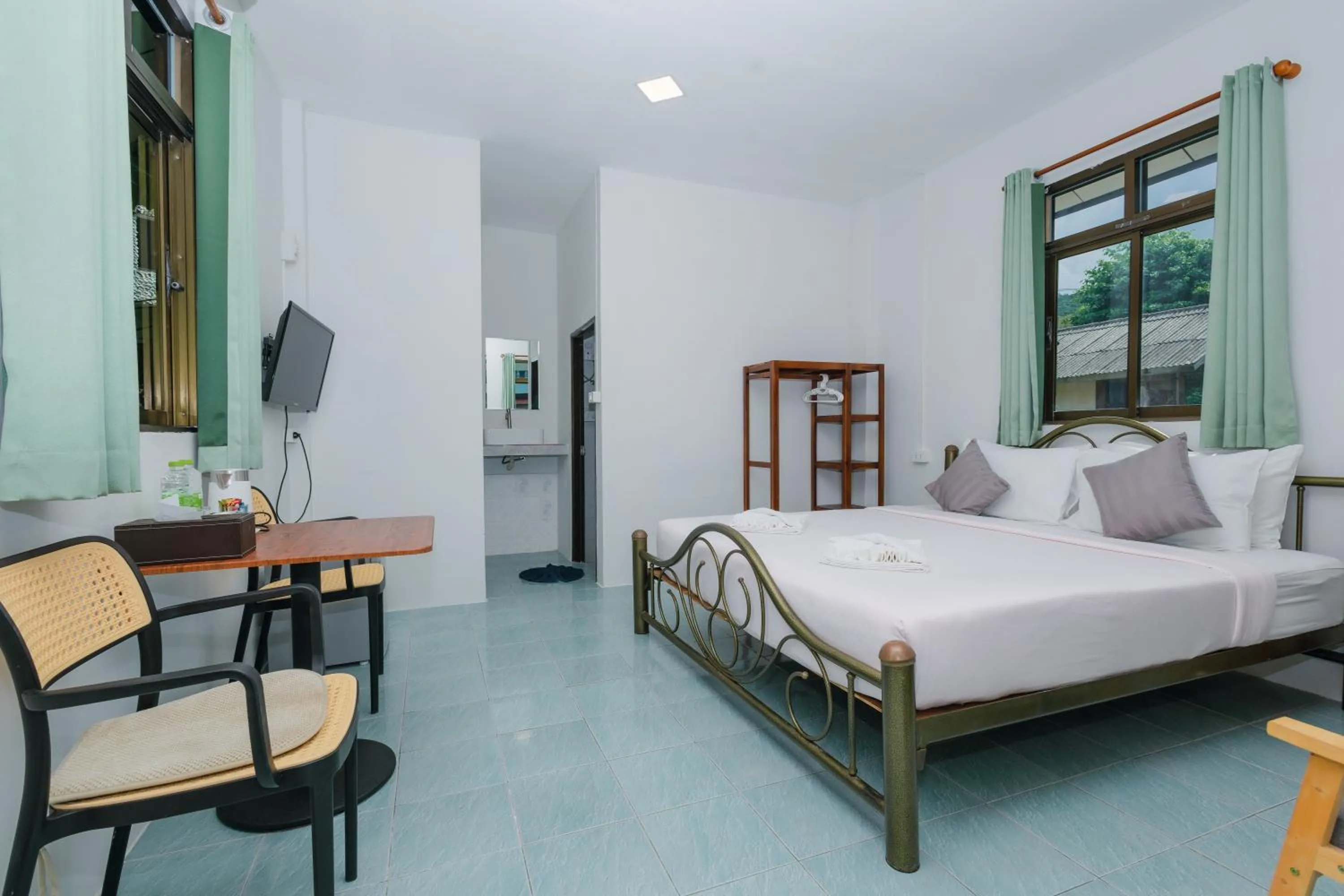 Photo of the whole room, Bed in Charung by The Sea