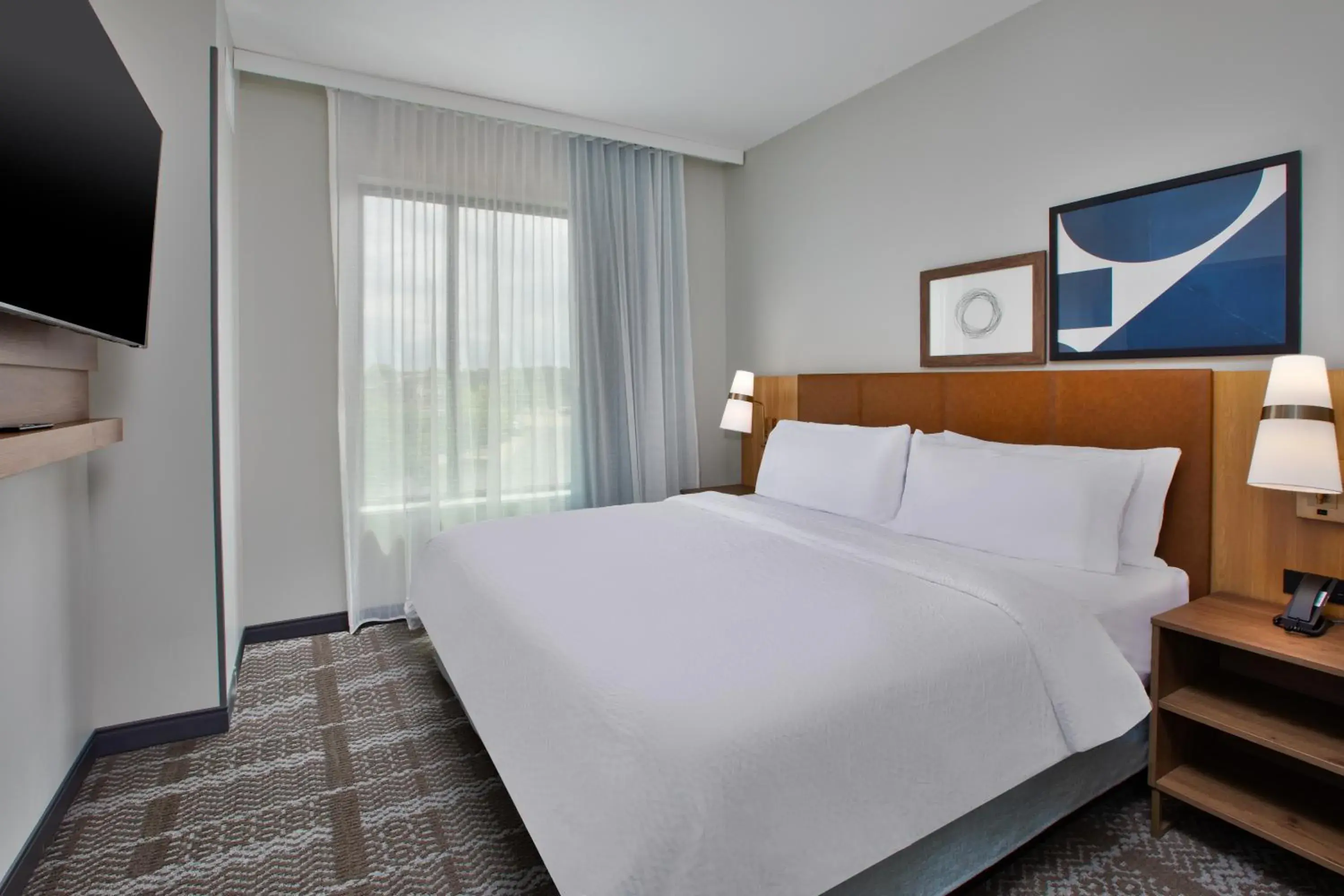 Bed in Staybridge Suites Grand Rapids South by IHG Bed in Staybridge Suites Grand Rapids South by IHG