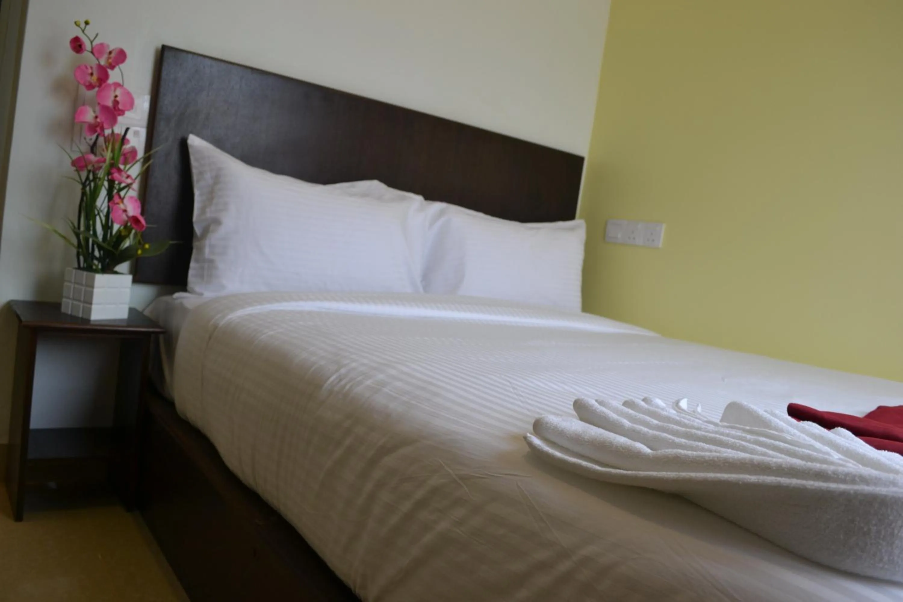 Bed in DR Hotel Penang