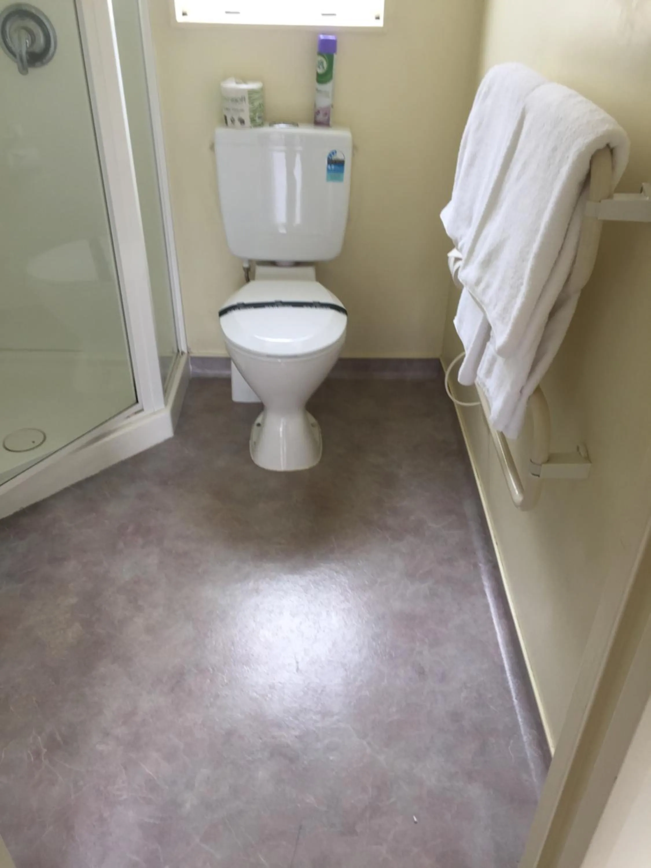 Toilet in Bentons Motel