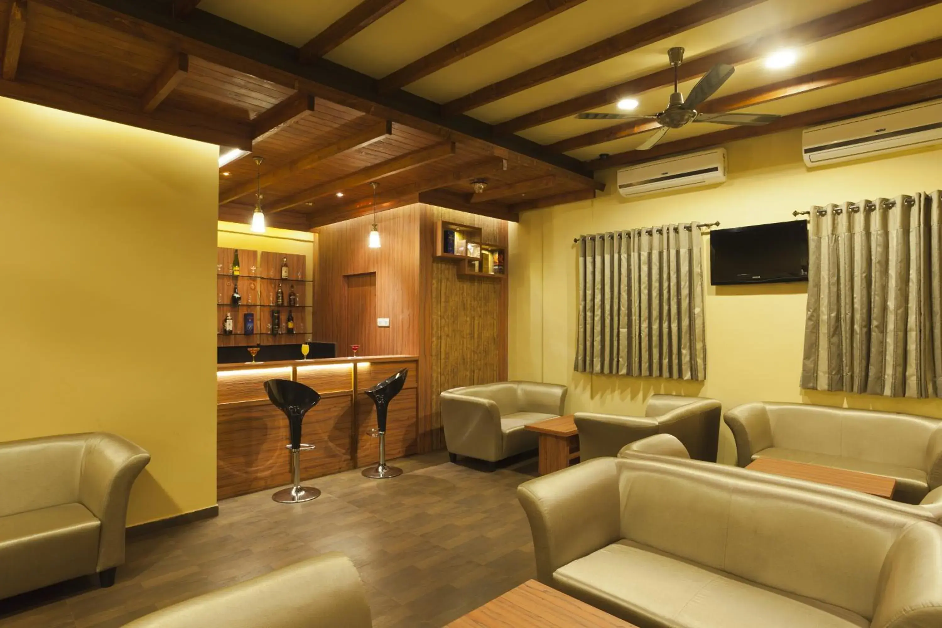 Lounge or bar in Hotel Atria, Kolhapur Lounge or bar in Hotel Atria, Kolhapur