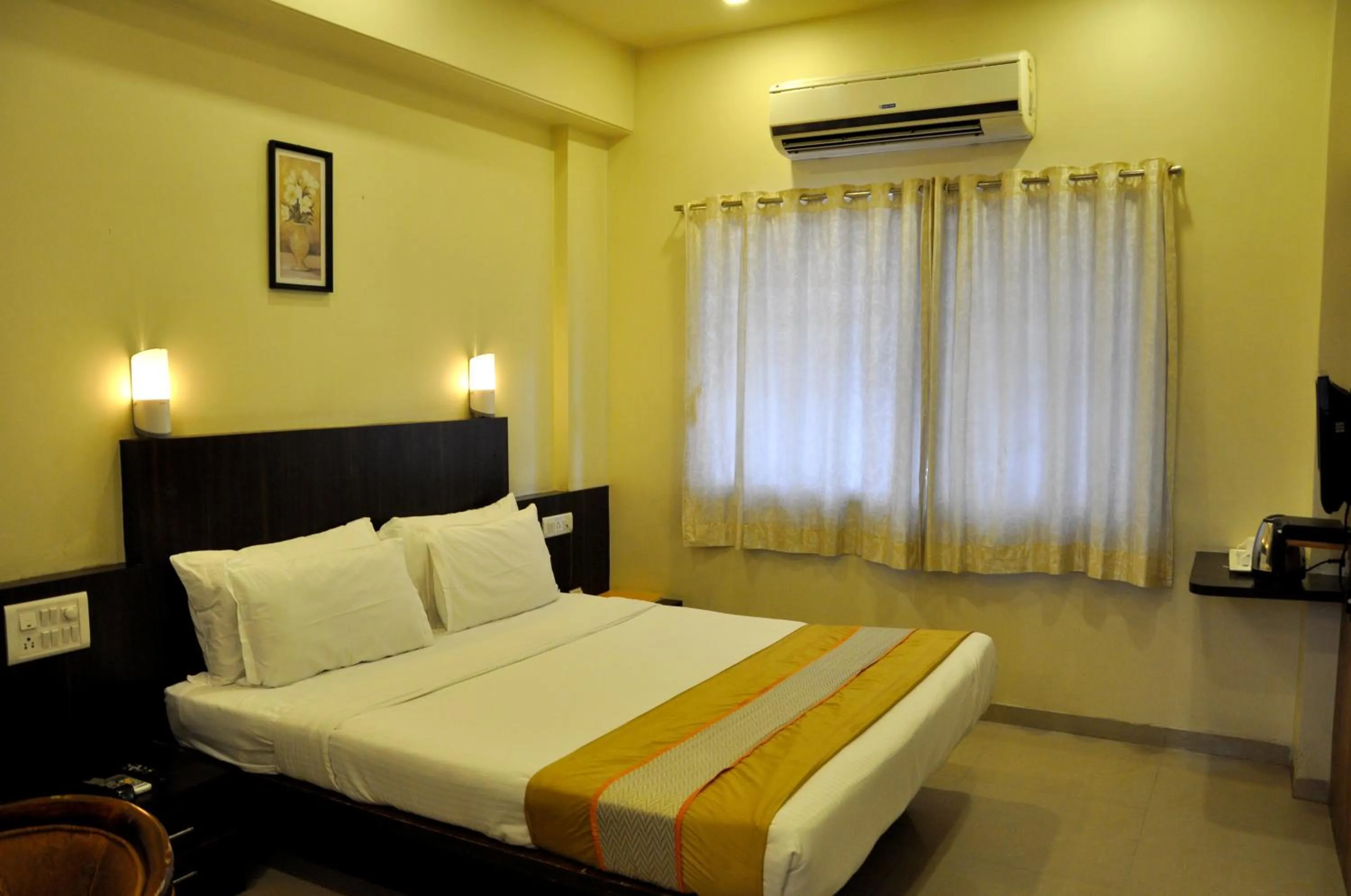 Bed in Hotel Atria, Kolhapur