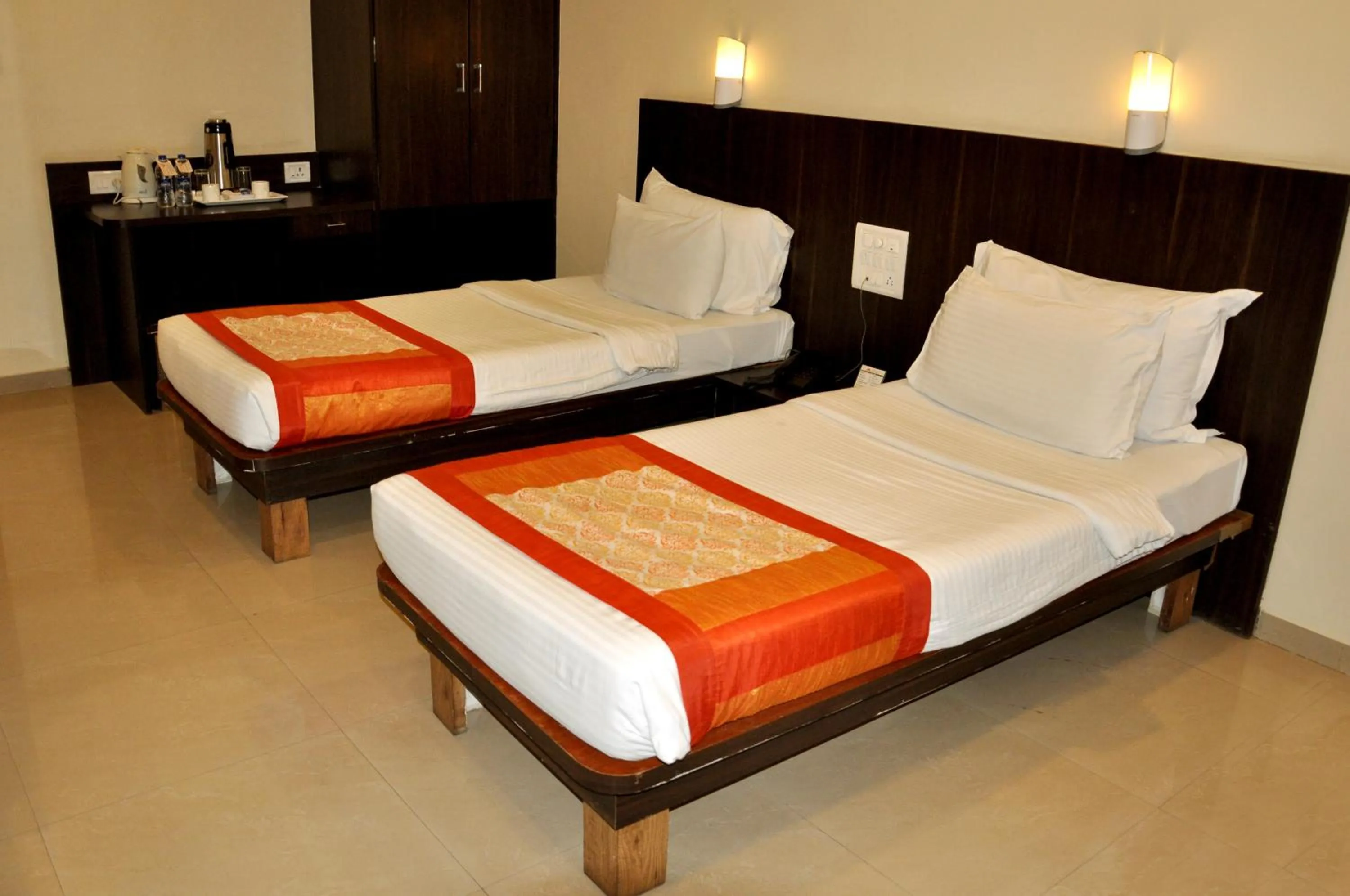 Bed in Hotel Atria, Kolhapur