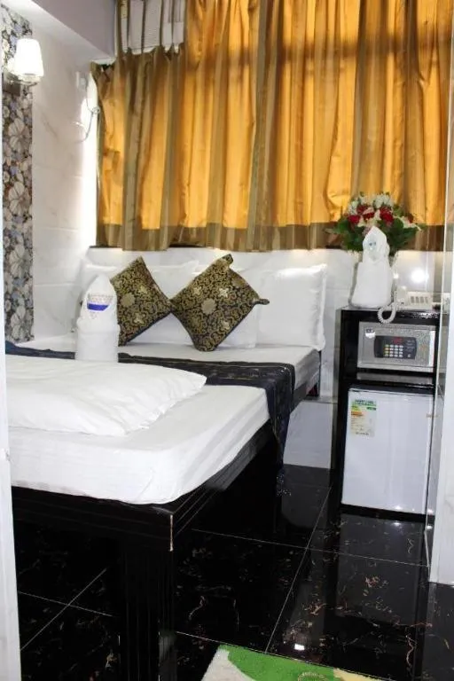 Bed in Om Guest House