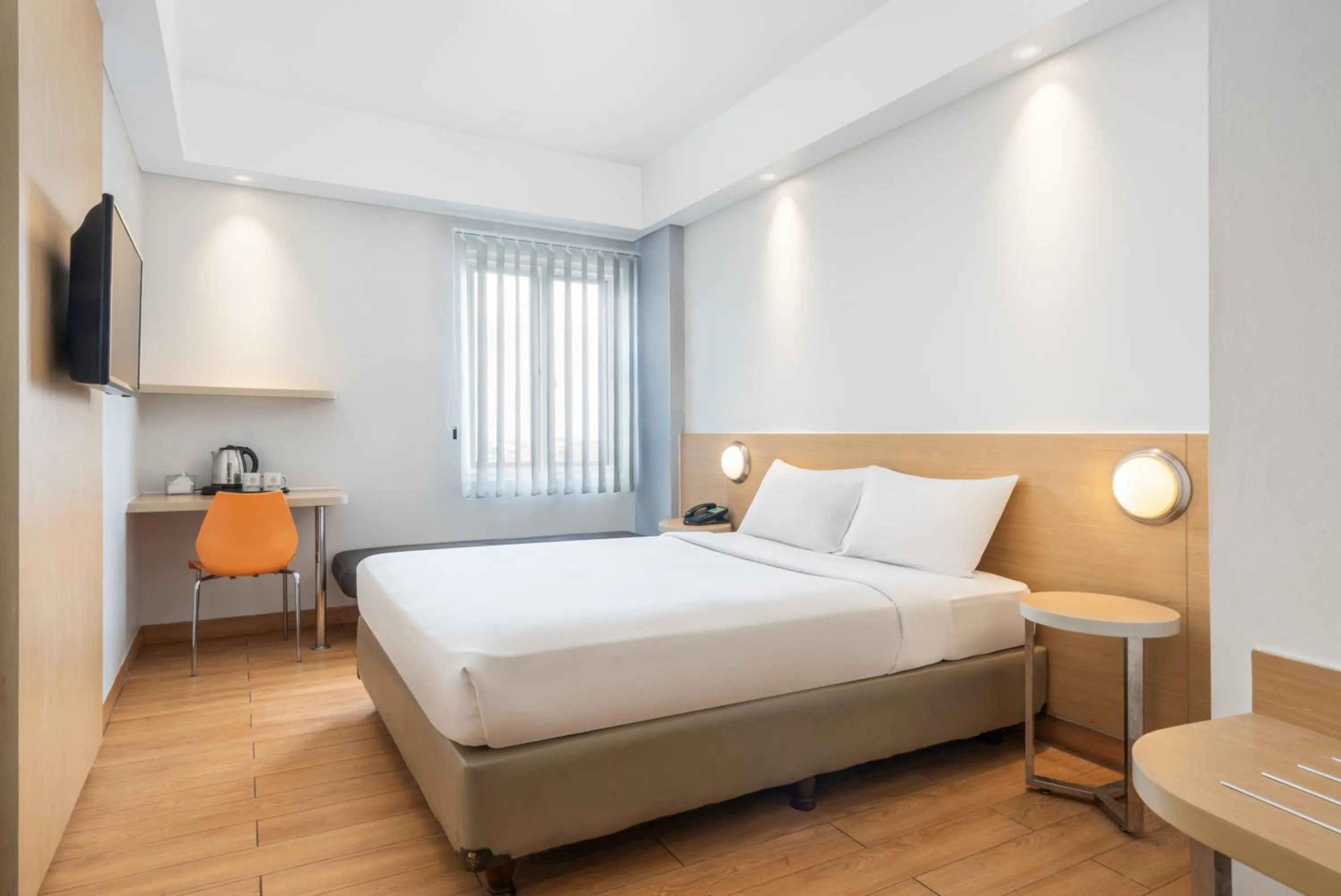 Bed in Indies Style Malioboro Hotel