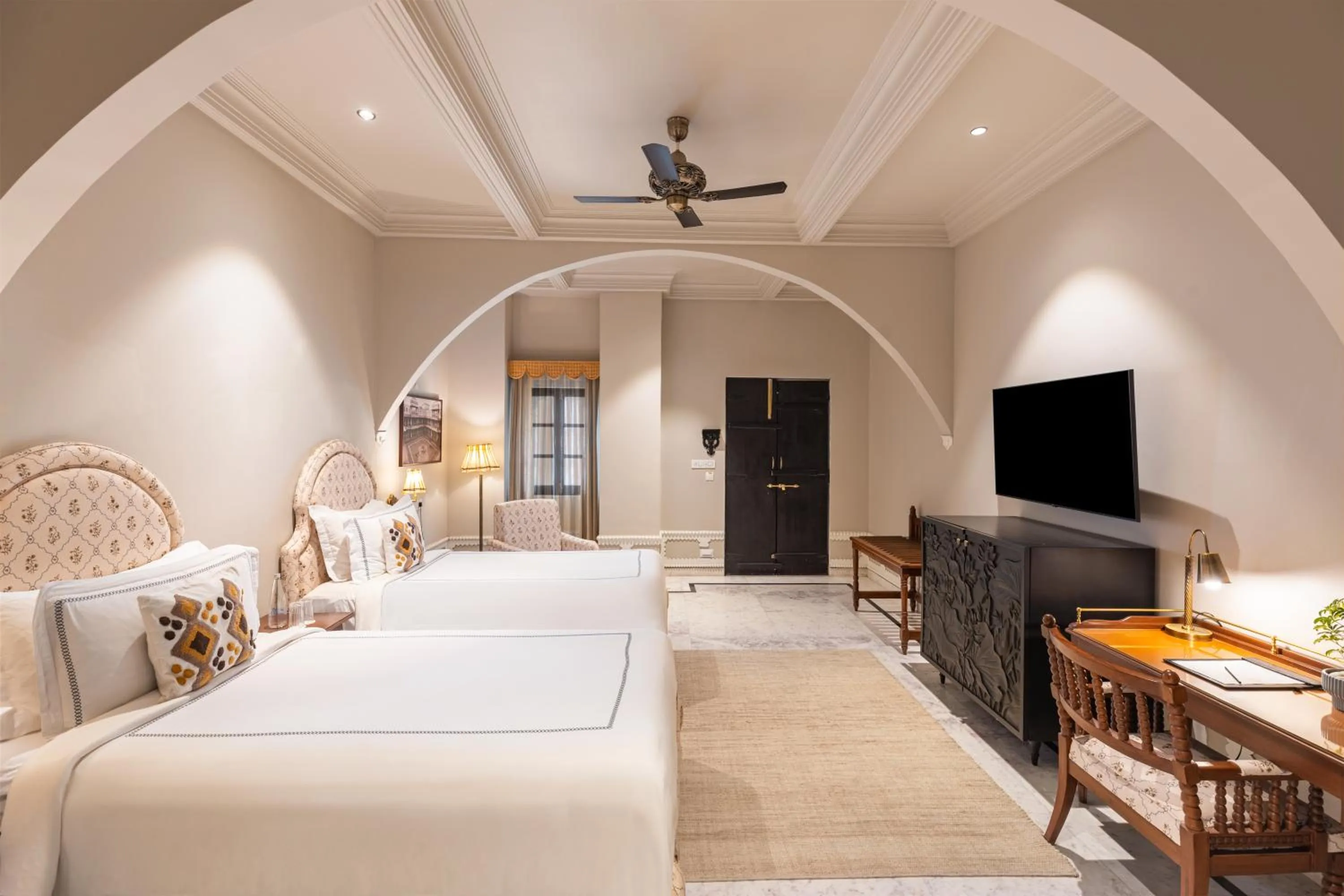 Bed in Daulatgarh Resort