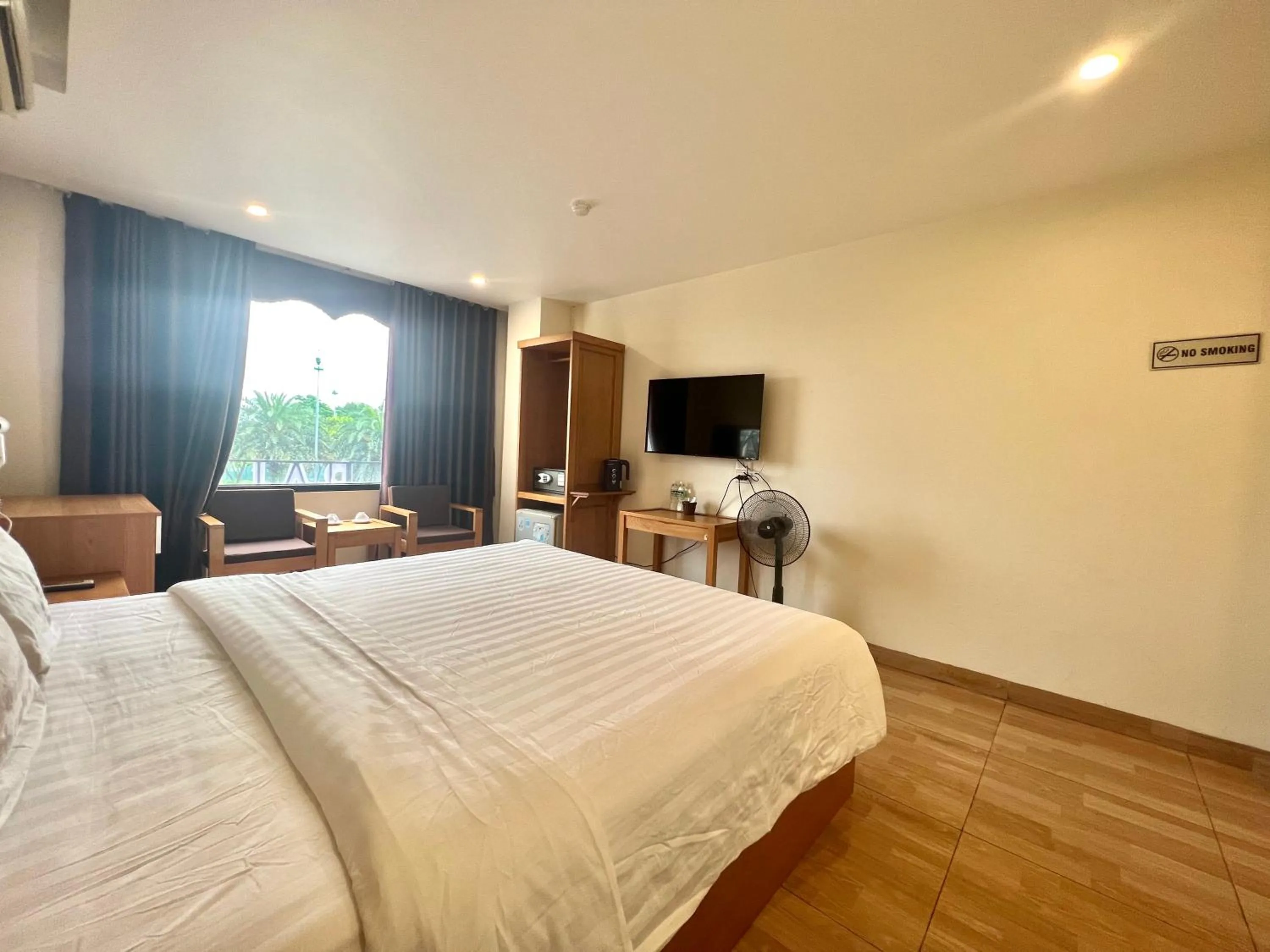 Bed in Dragon Airport Hotel