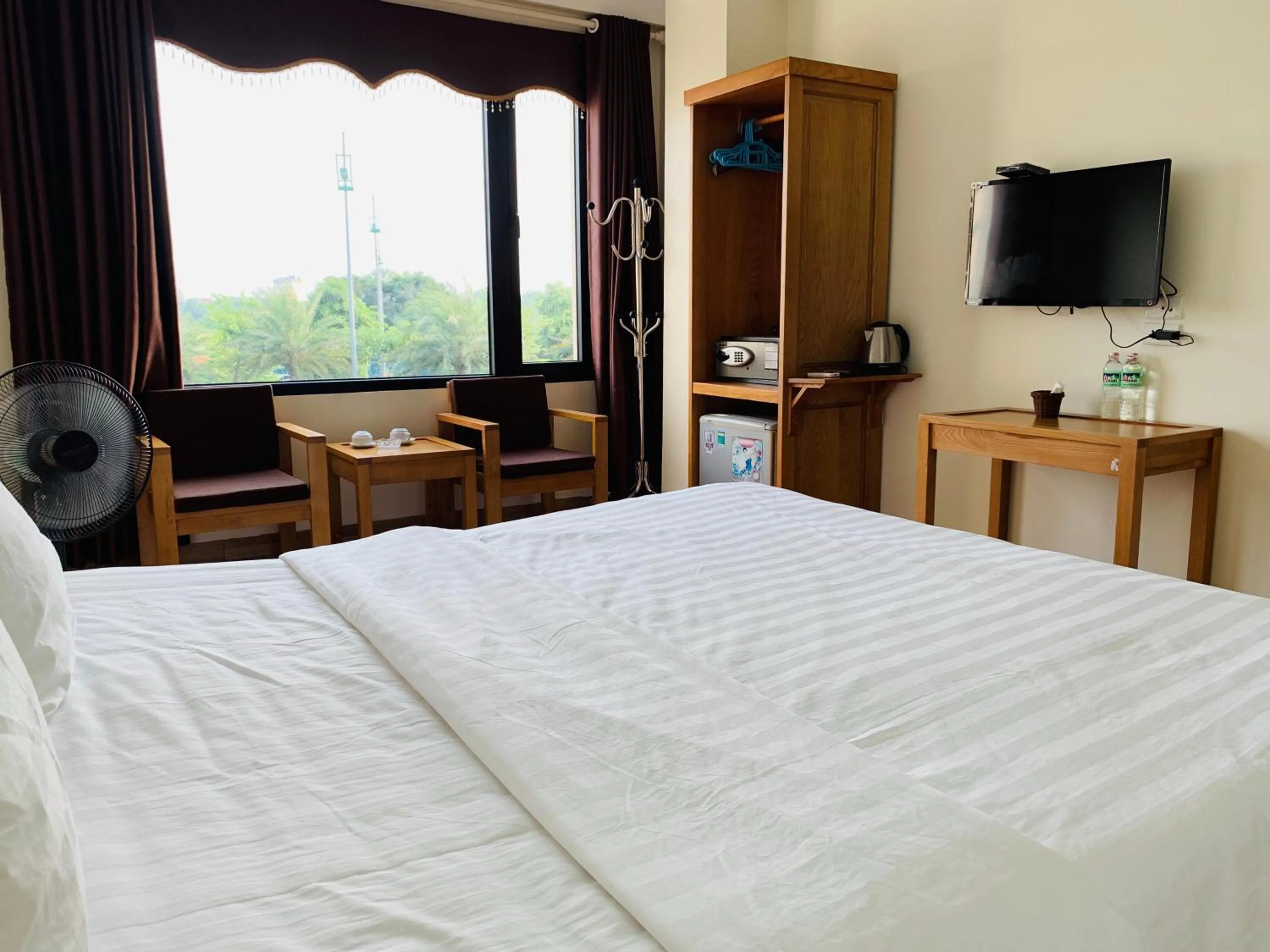 Bed in Dragon Airport Hotel