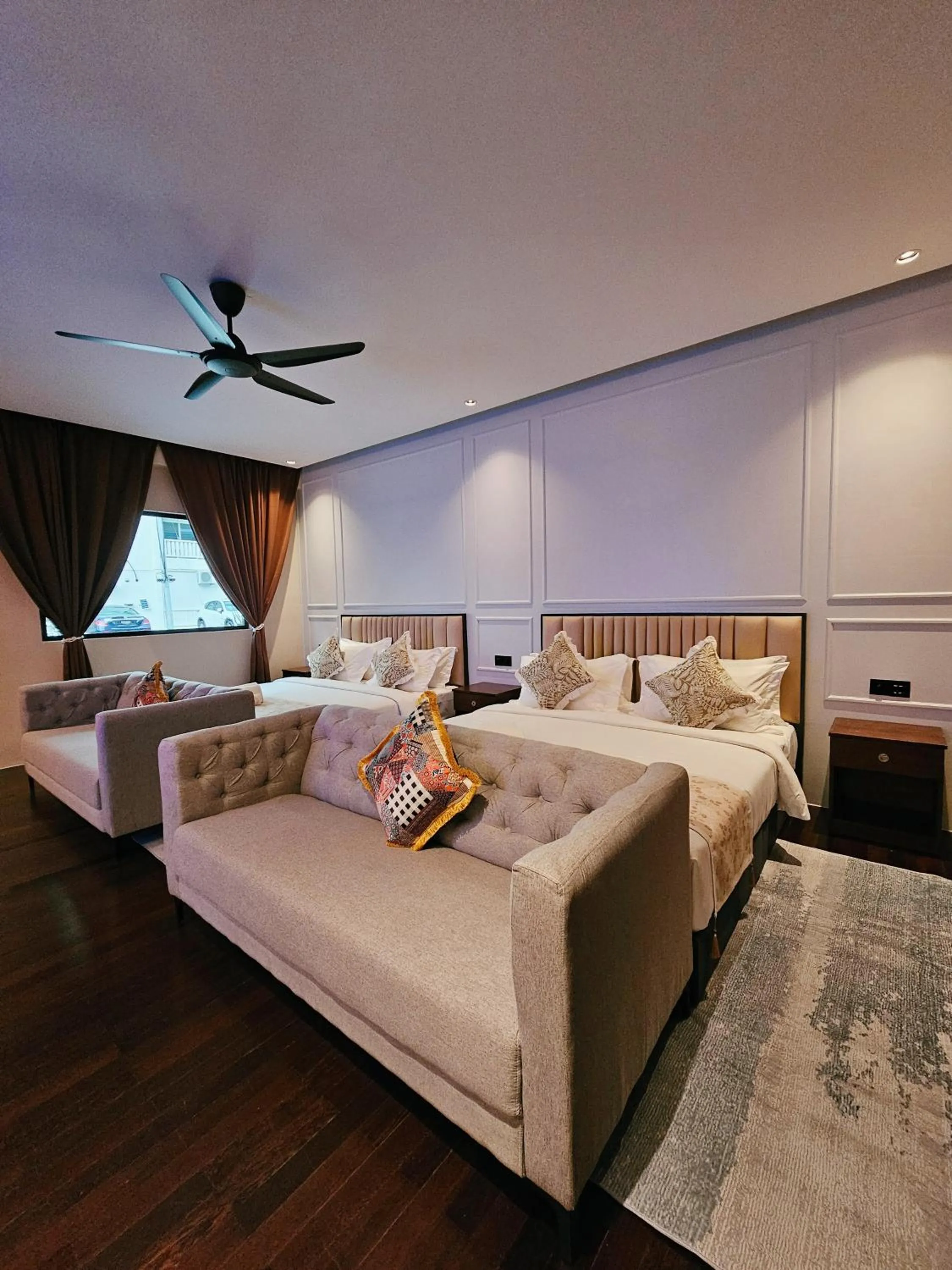 Bed in The Palm Suite at Lava Mansion