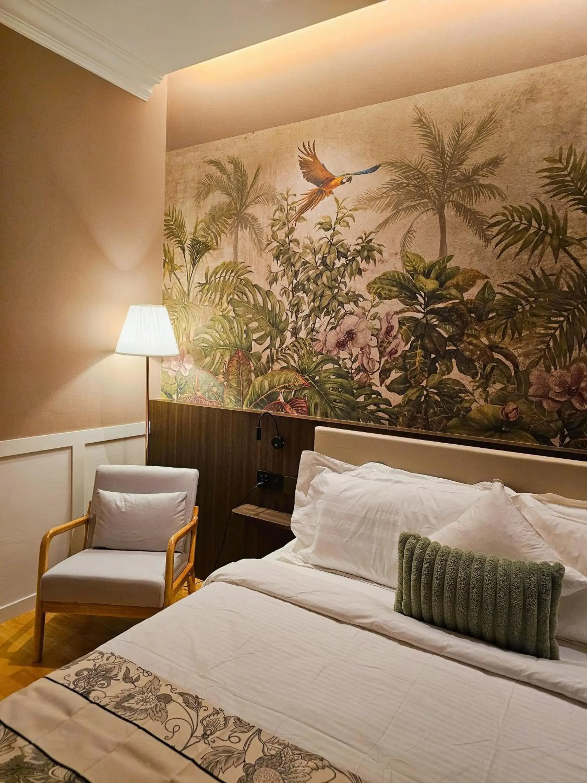 Bed in The Palm Suite at Lava Mansion Bed in The Palm Suite at Lava Mansion