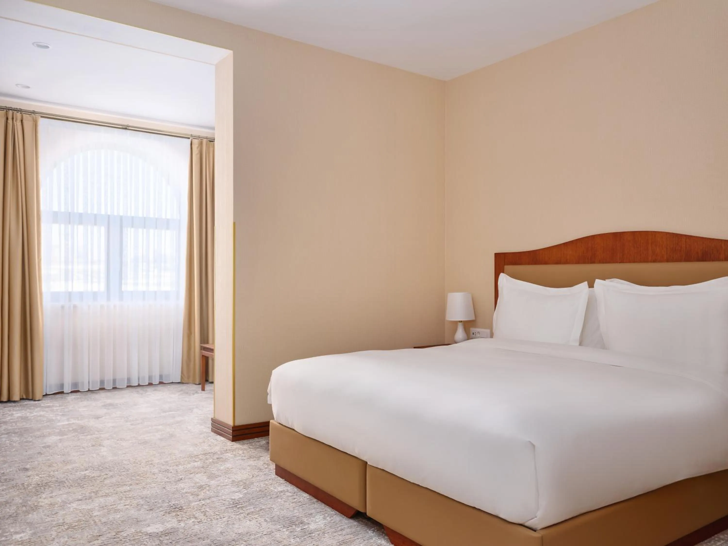 Bed in The Central Point Hotel Baku