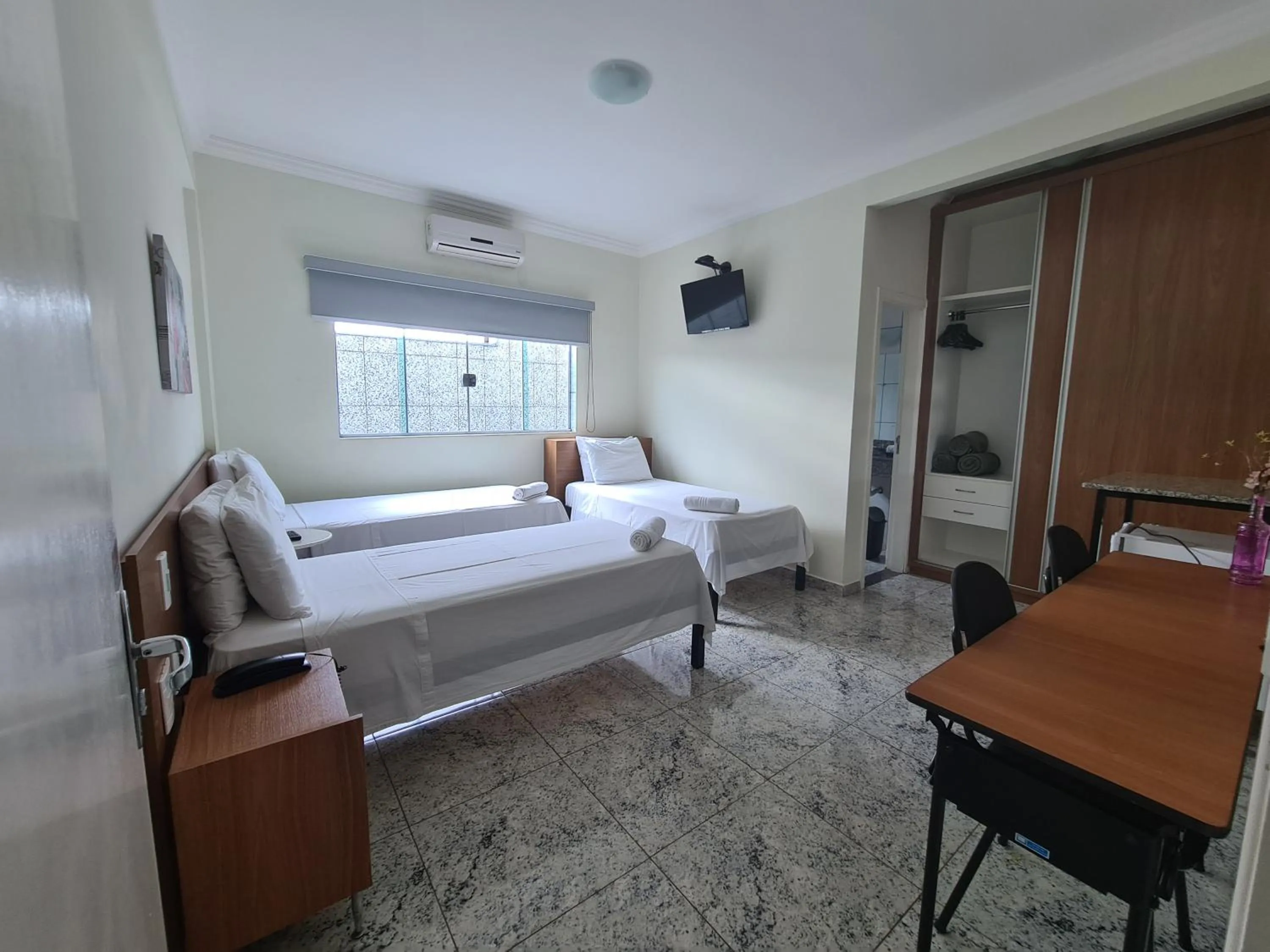 Property building, Bed in Hotel Flor de Minas