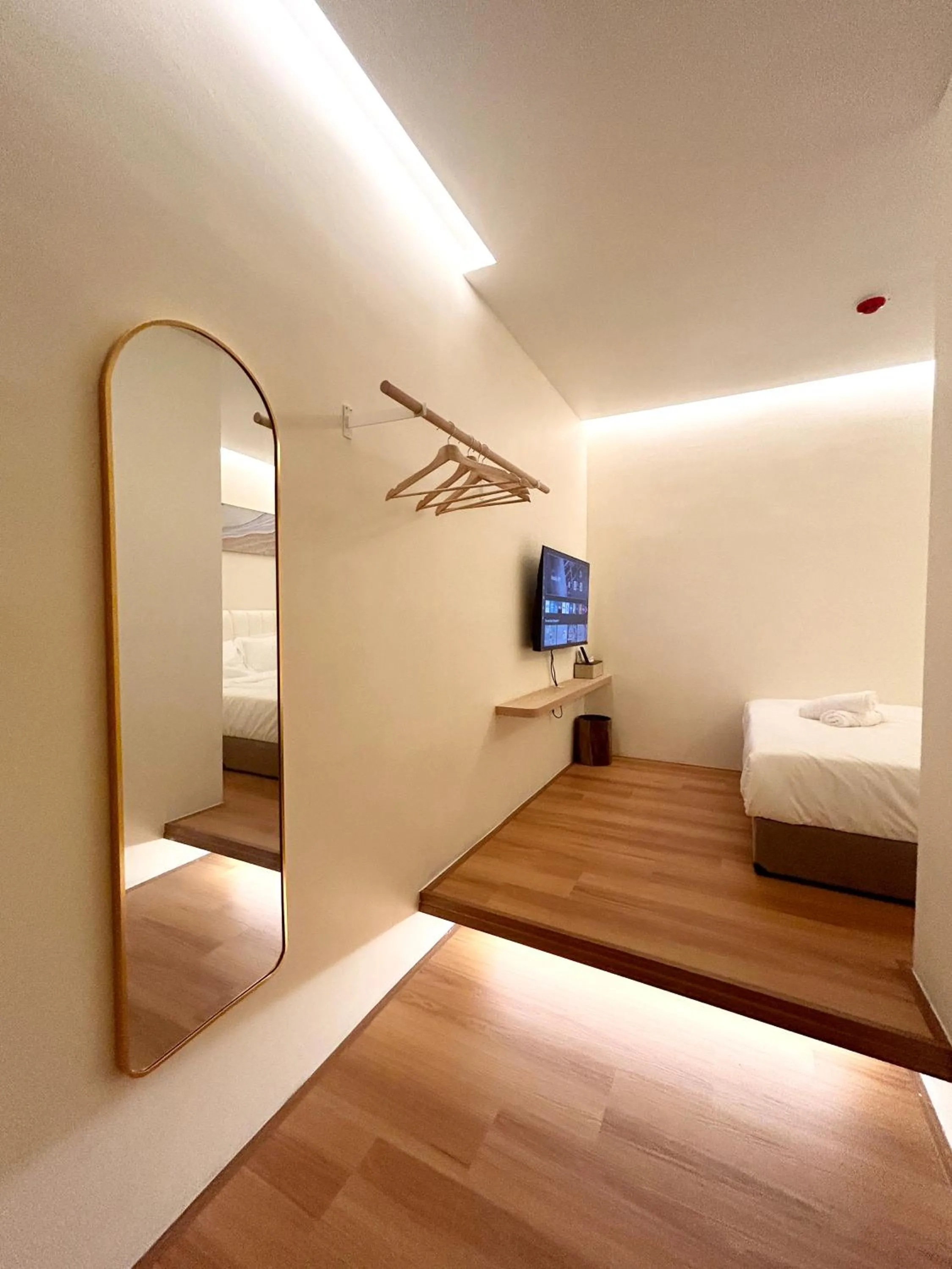 Bed in ONE18 Boutique Hotel