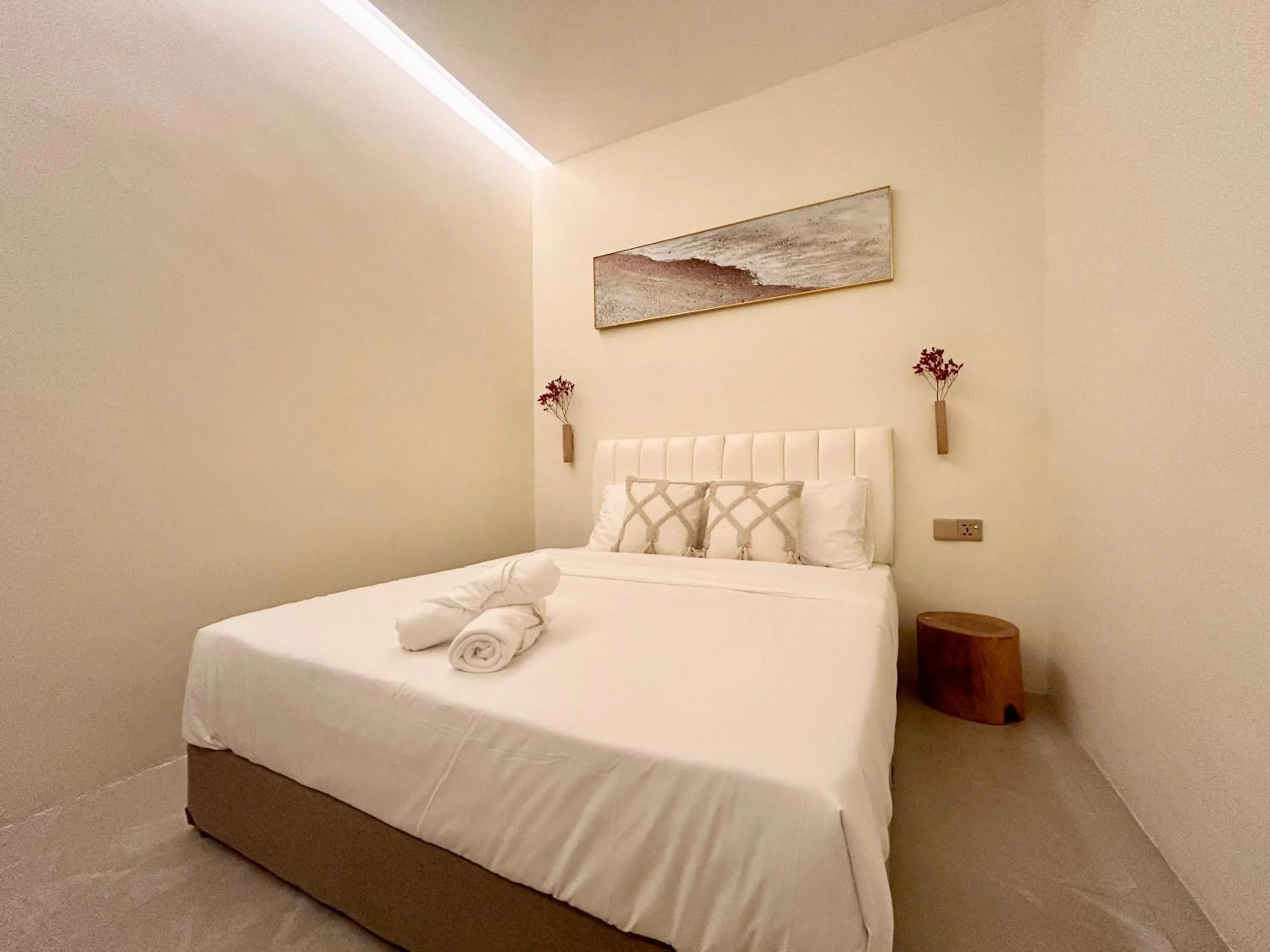 Bed in ONE18 Boutique Hotel