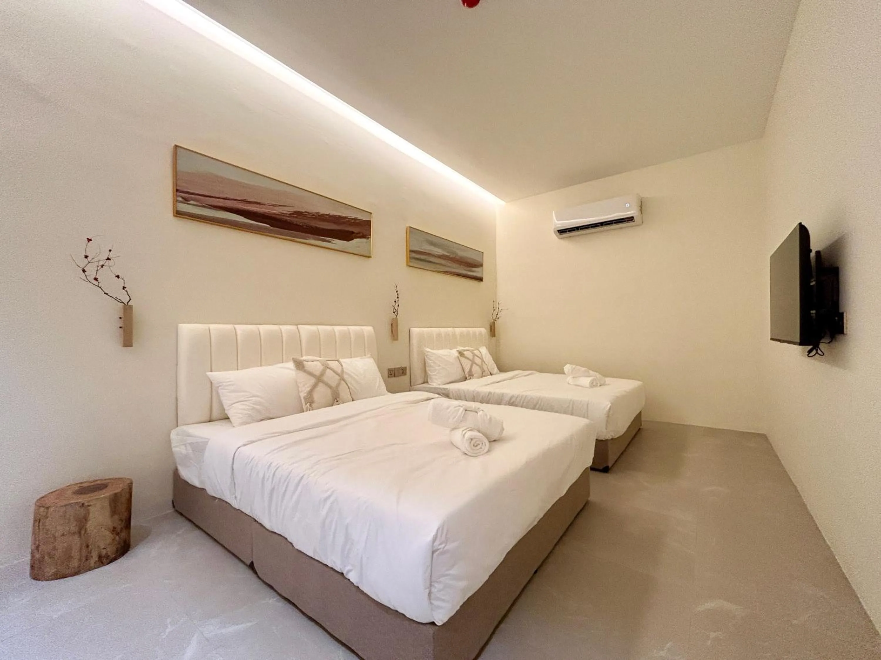 Bed in ONE18 Boutique Hotel