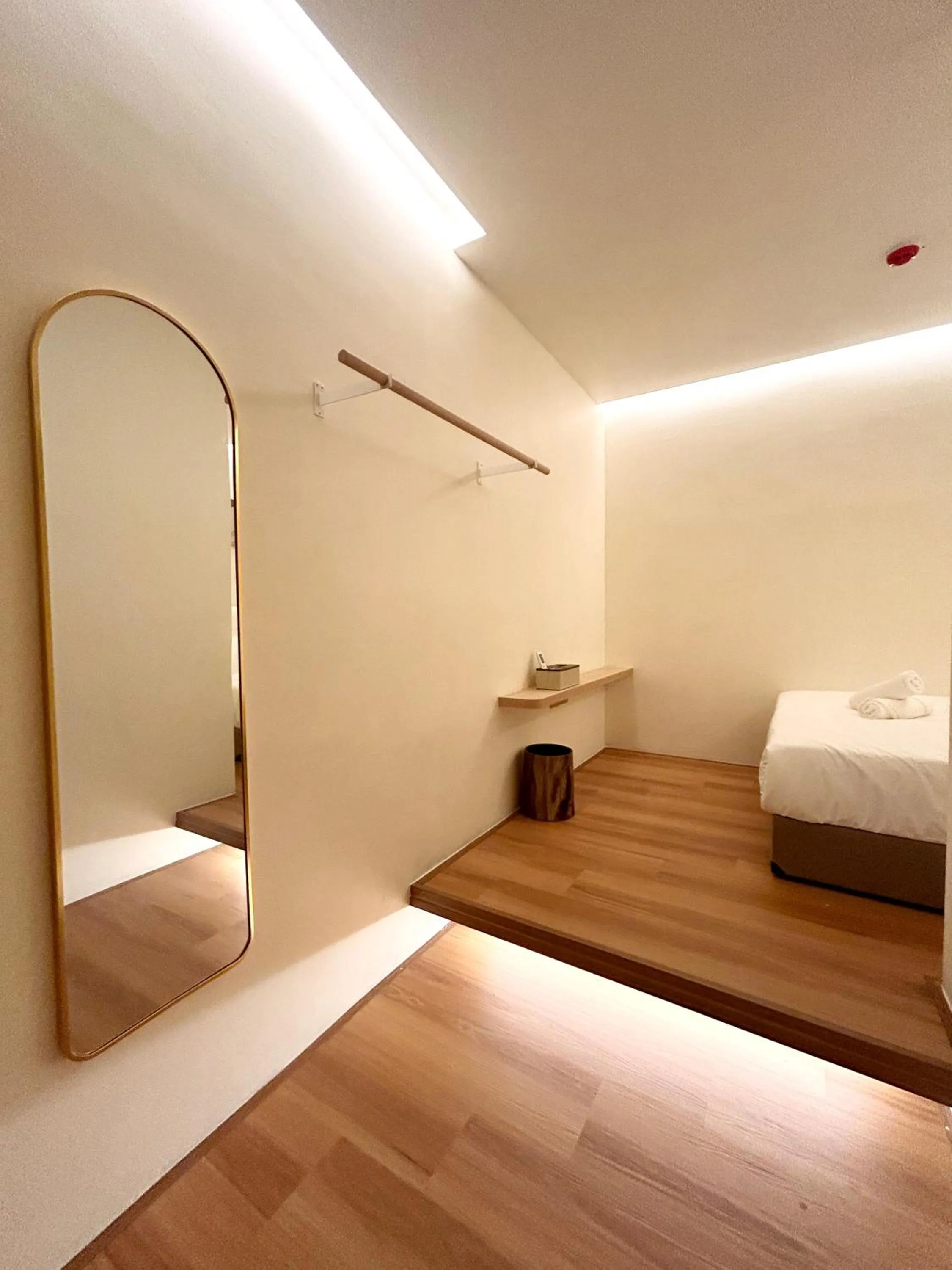 Bed in ONE18 Boutique Hotel