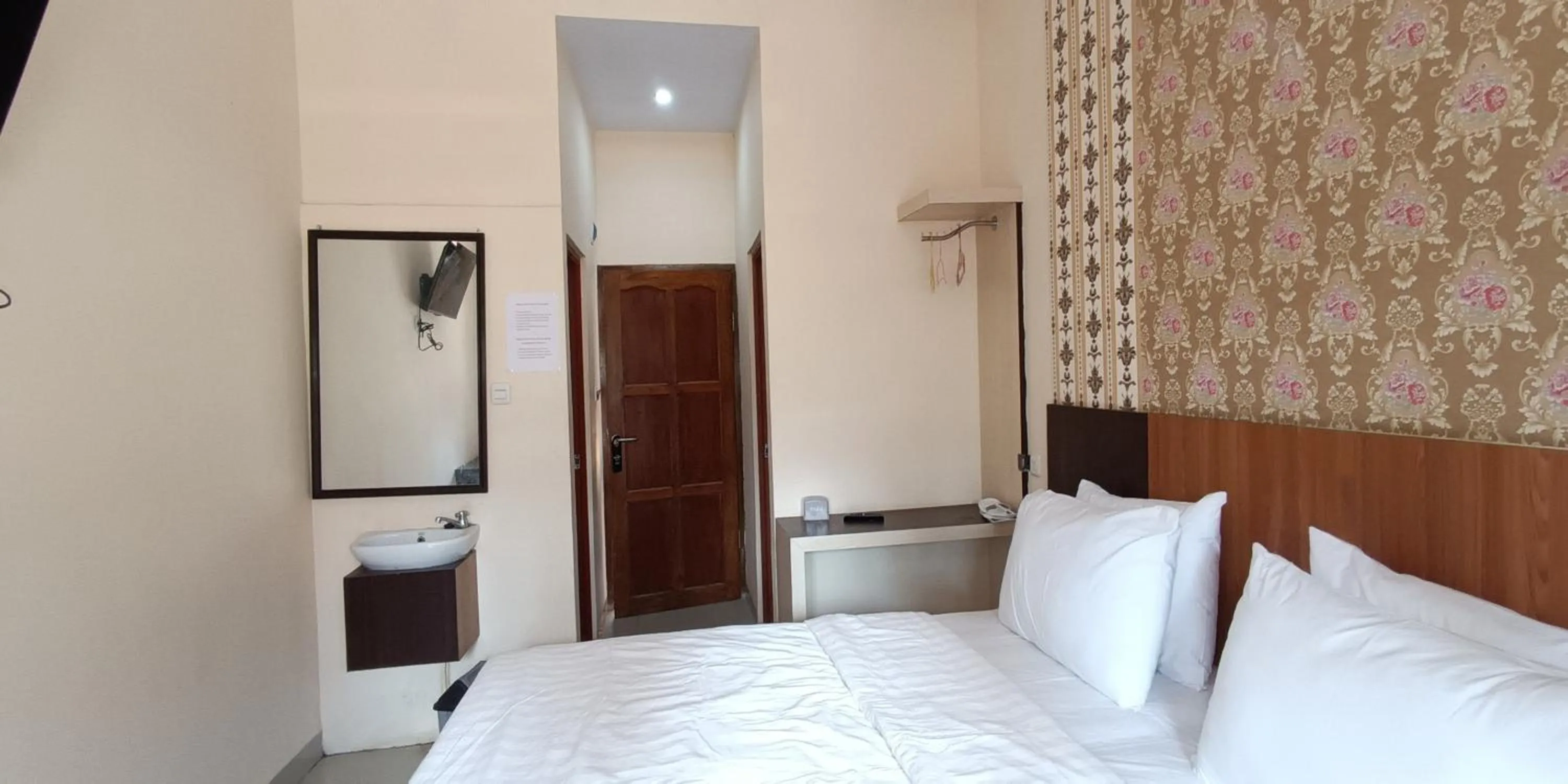 Bed in Hotel Lallangan