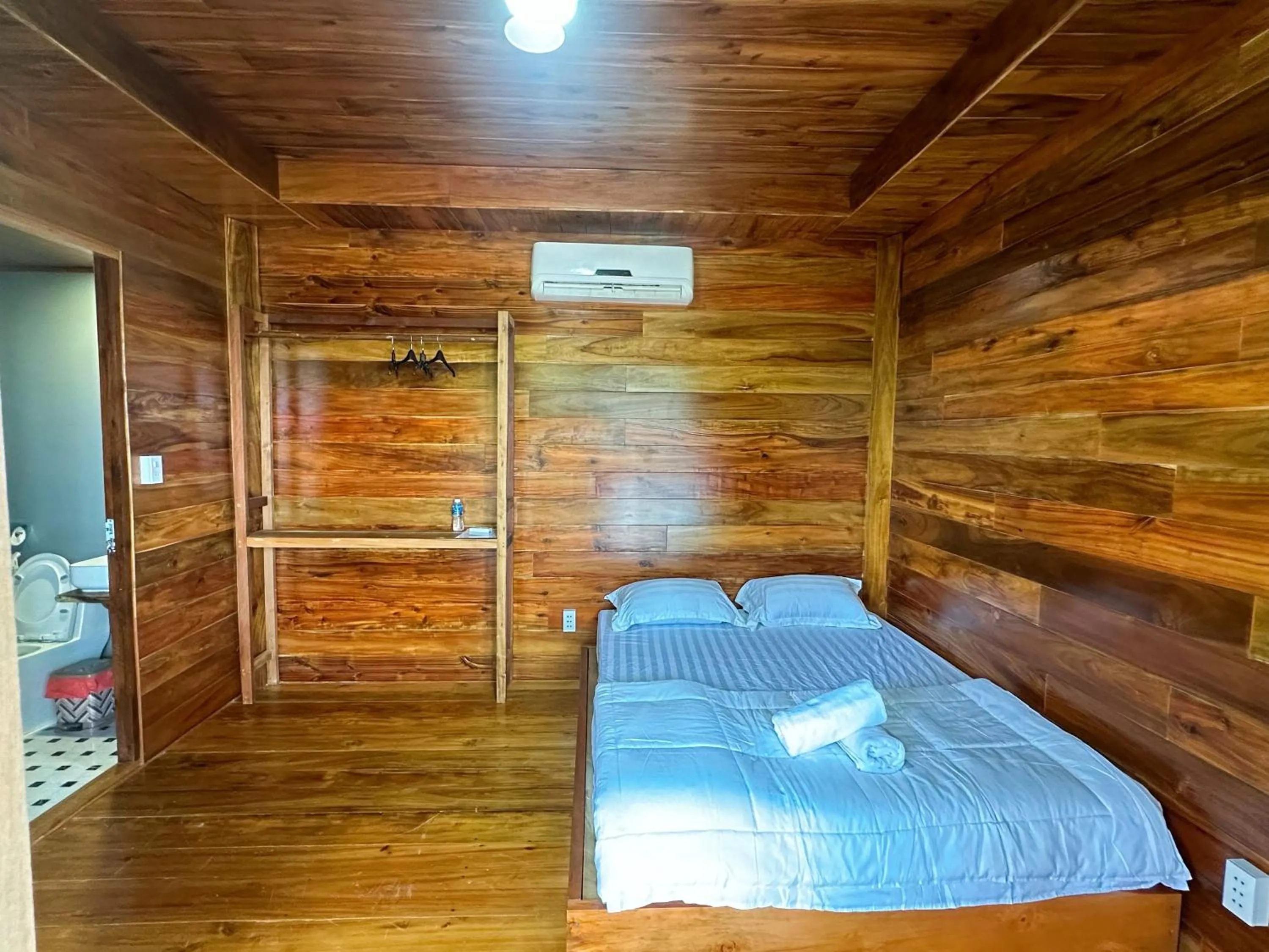 Bed in Waikiki Lagi Beach homestay & restaurant