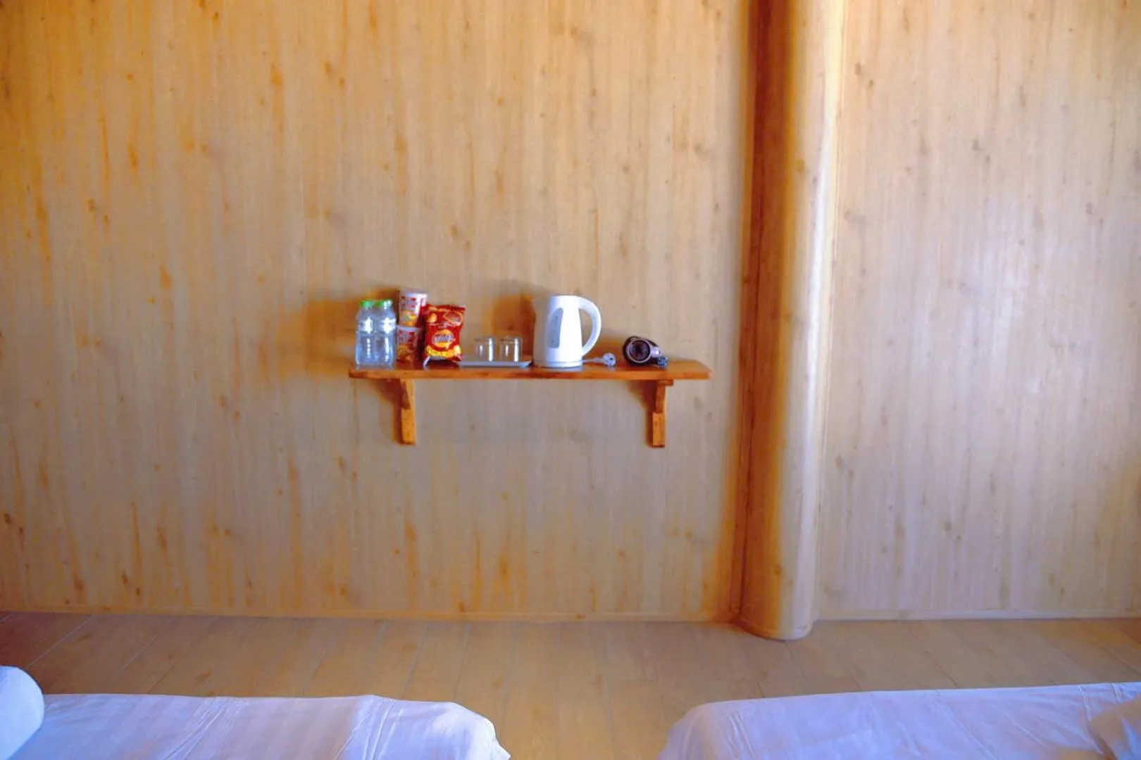 Bed in Waikiki Lagi Beach homestay & restaurant