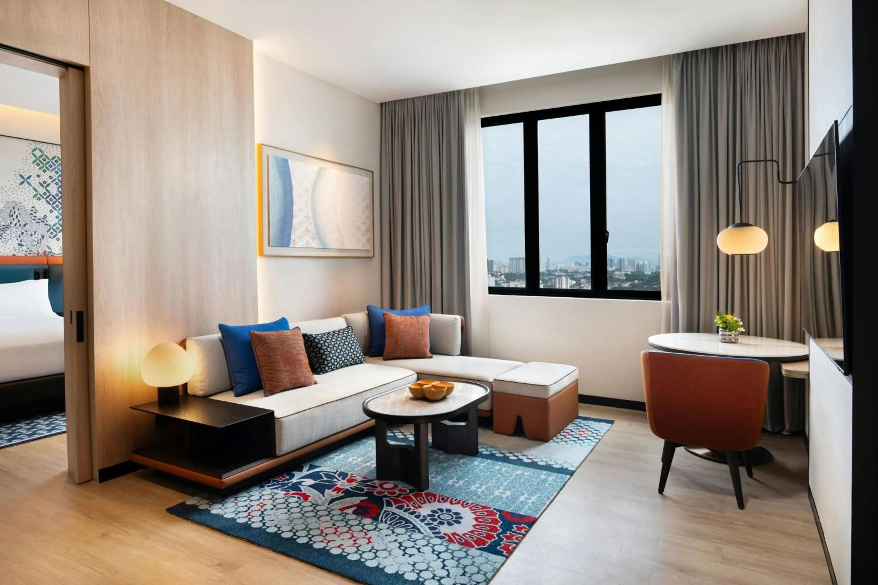 Living room, Bed in Iconic Marjorie Hotel, Penang, a Tribute Portfolio Hotel