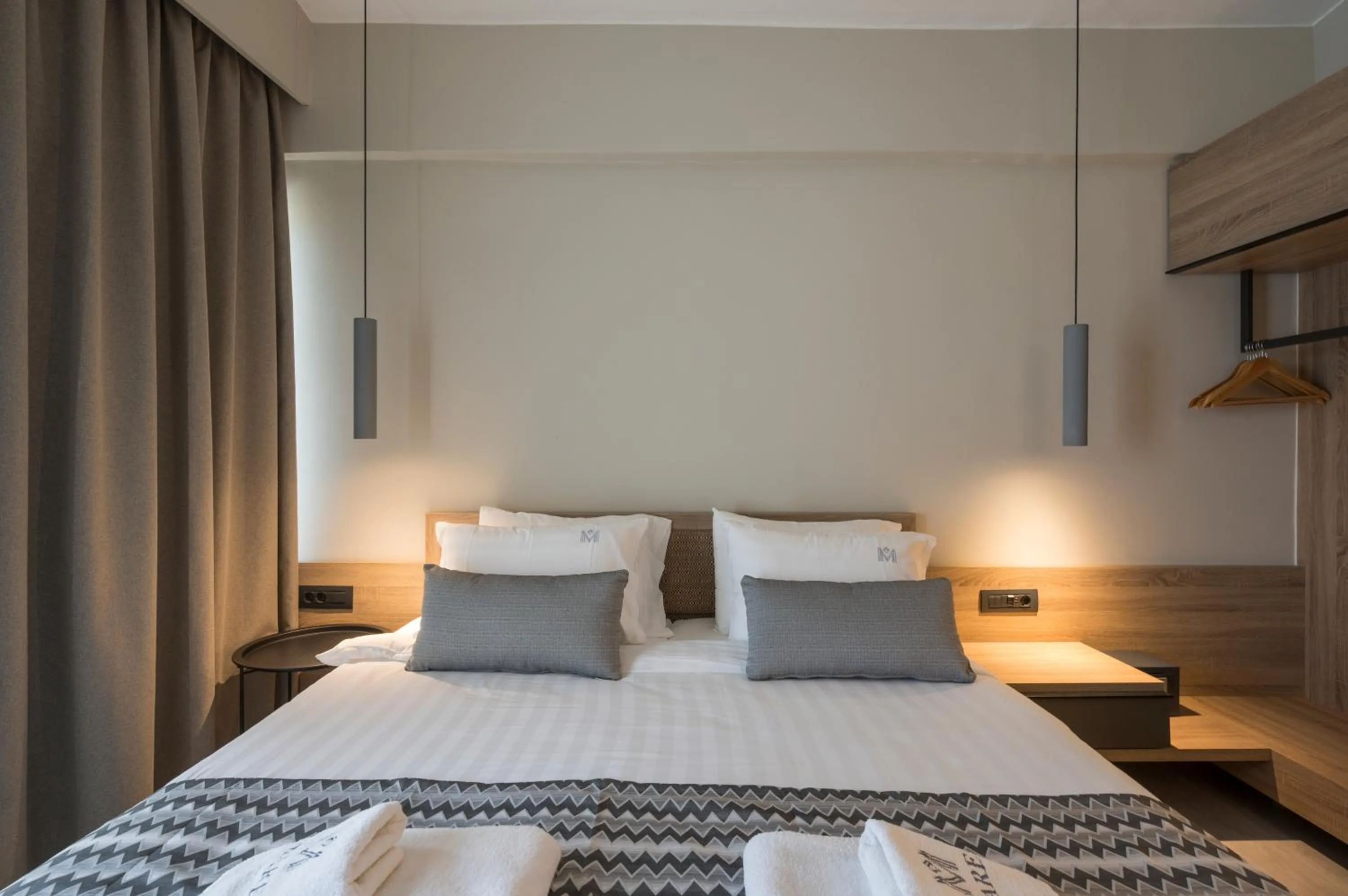 Bed in Mare Village Hotel