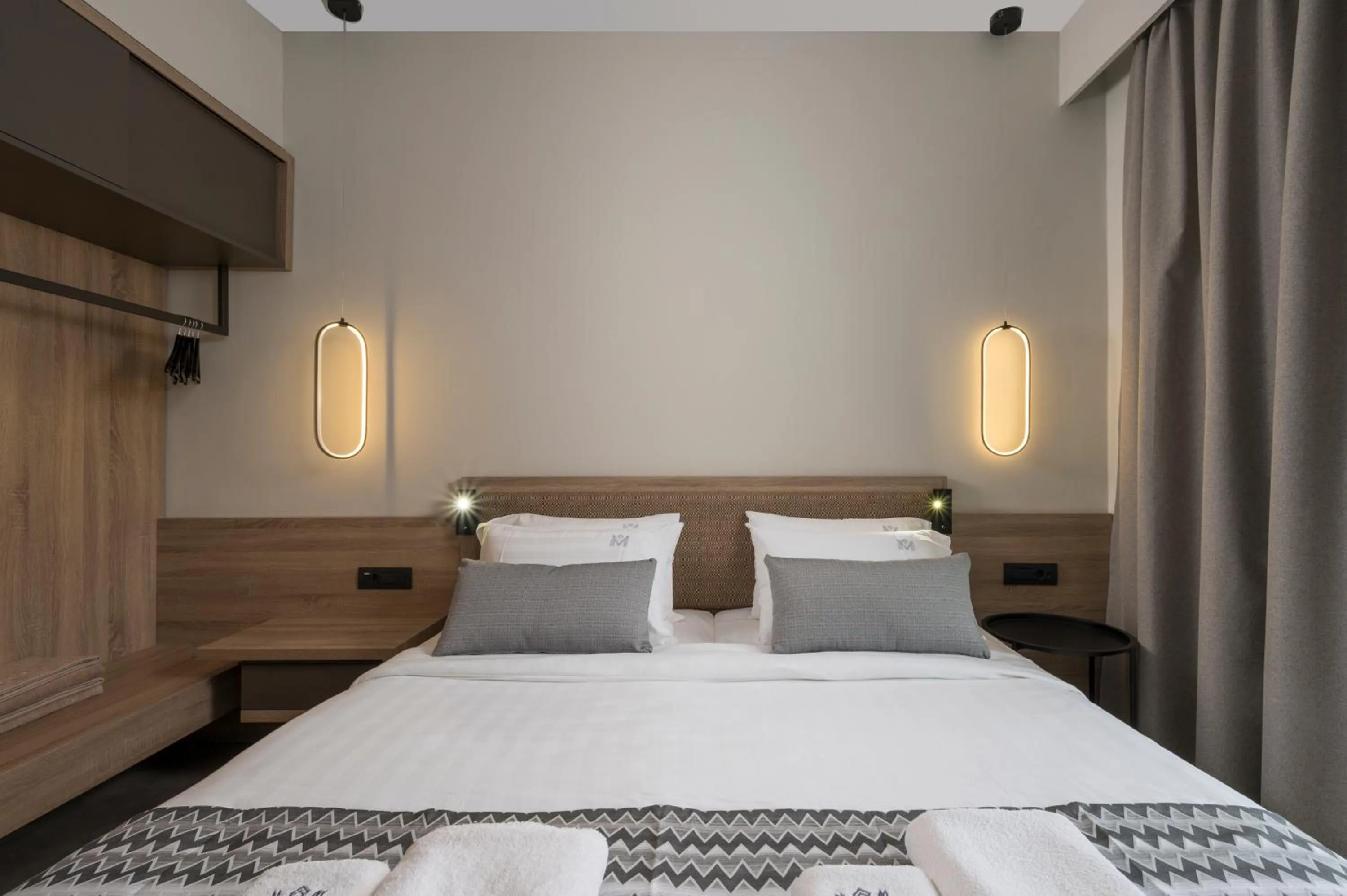 Bed in Mare Village Hotel