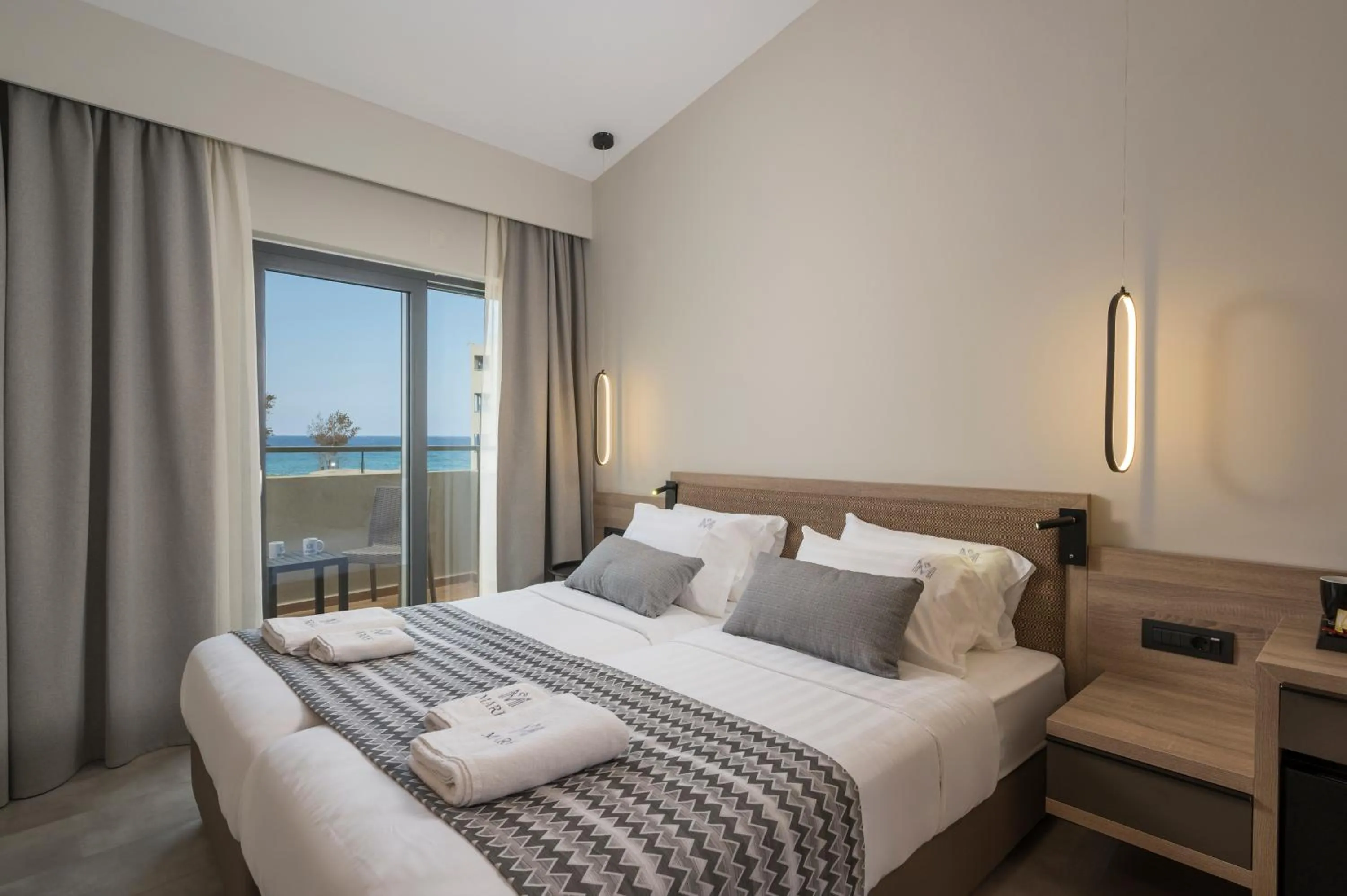 Bed in Mare Village Hotel