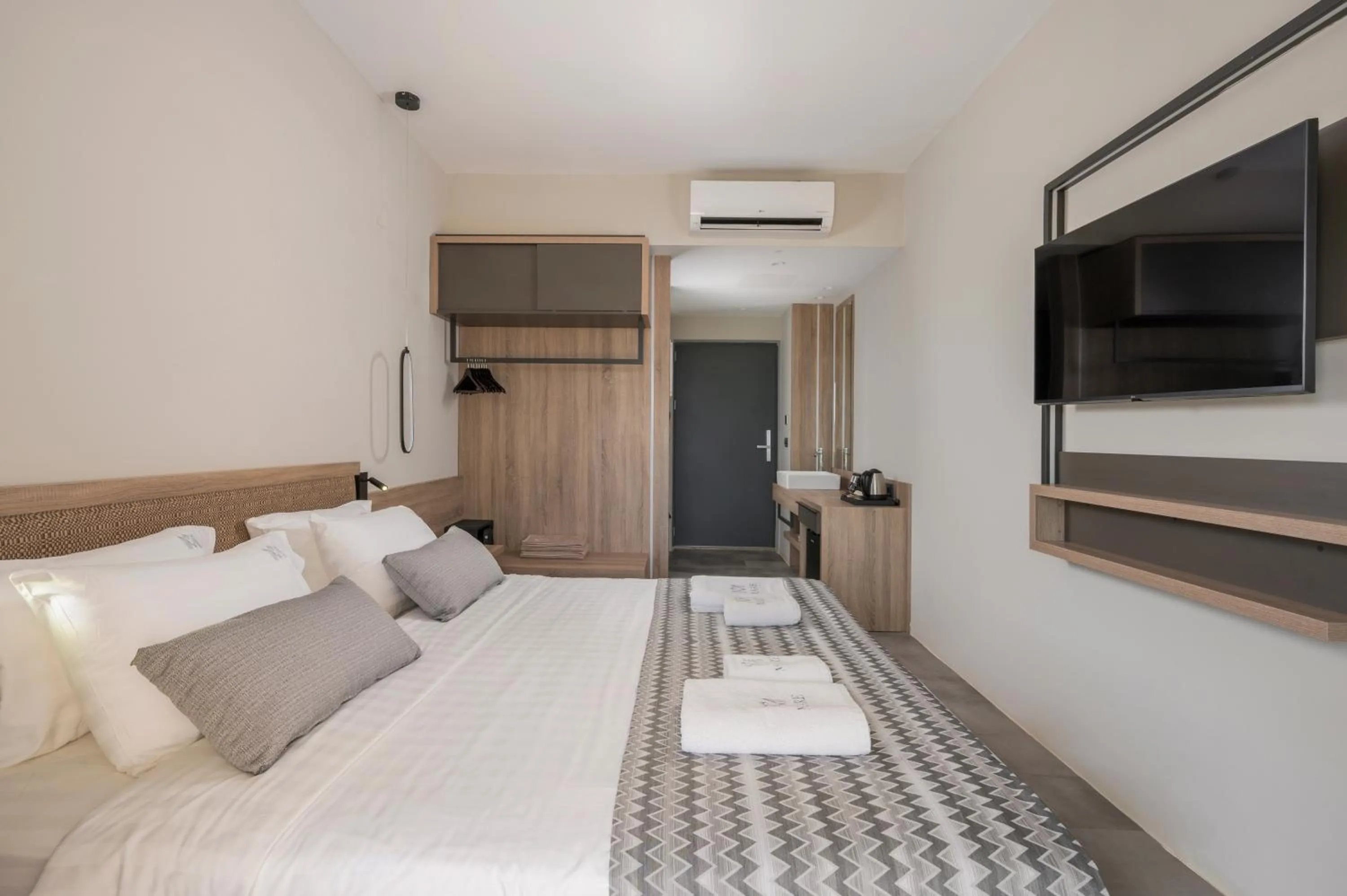 Bed in Mare Village Hotel