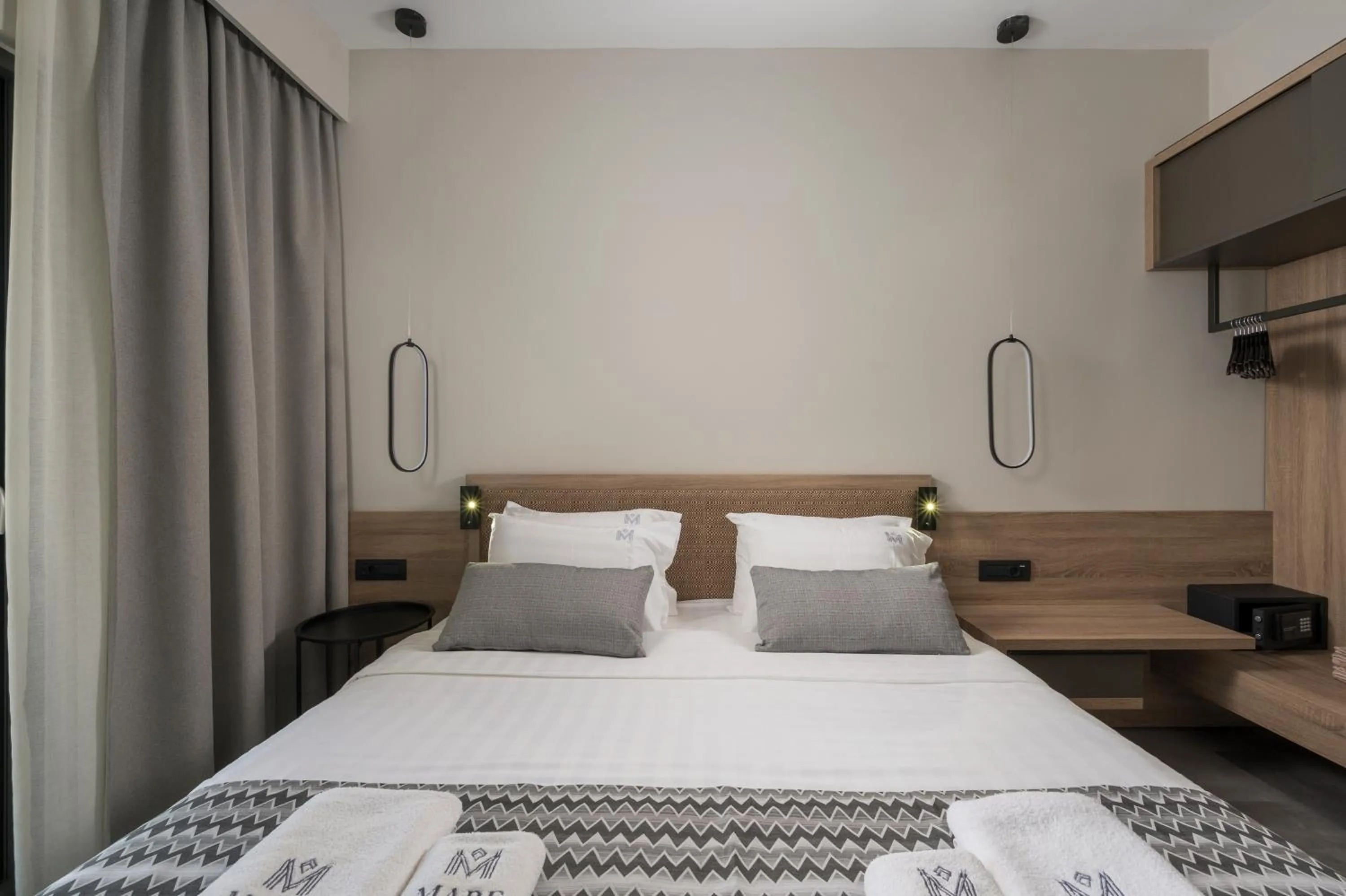 Bed in Mare Village Hotel