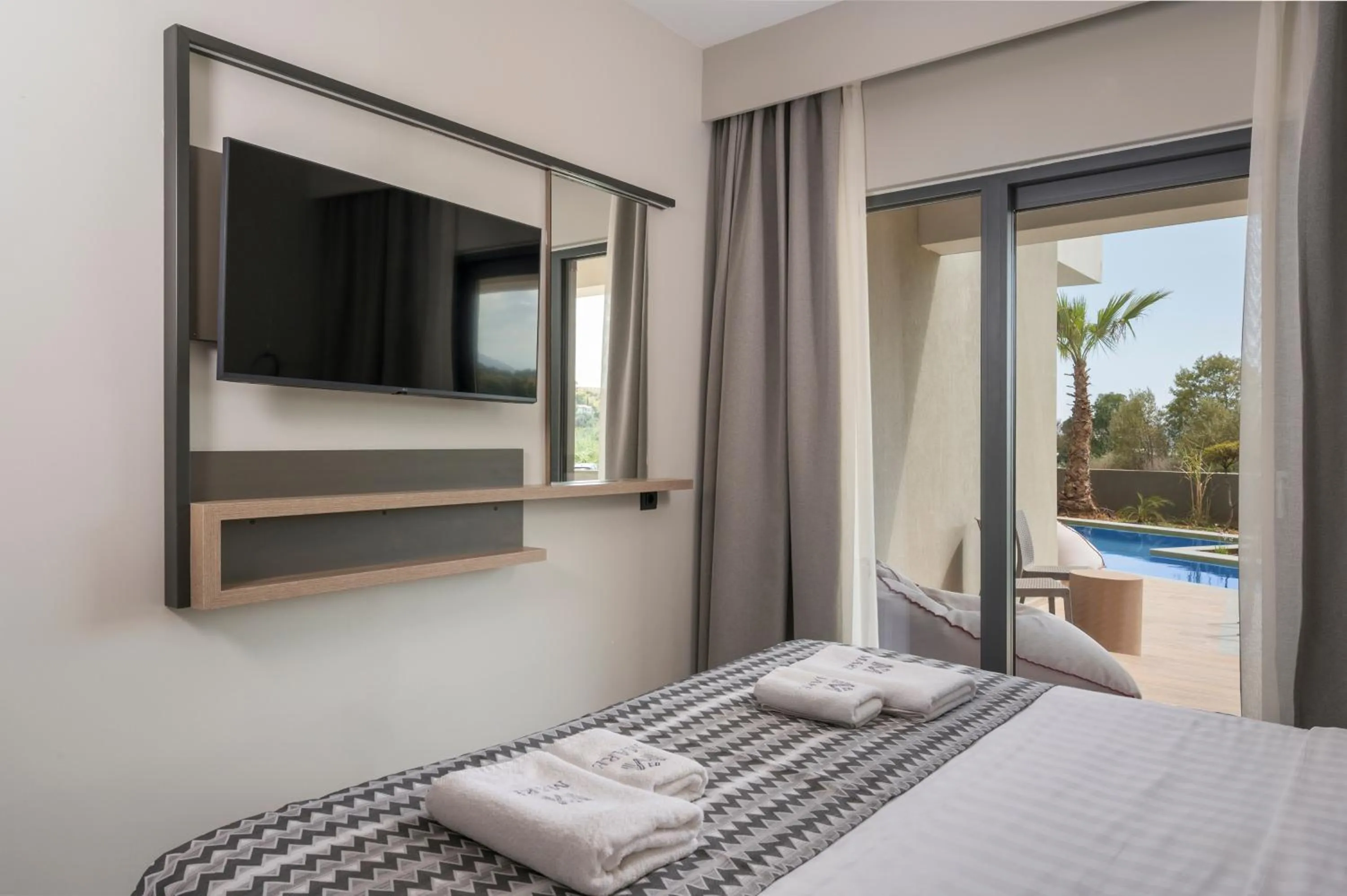 Bed in Mare Village Hotel