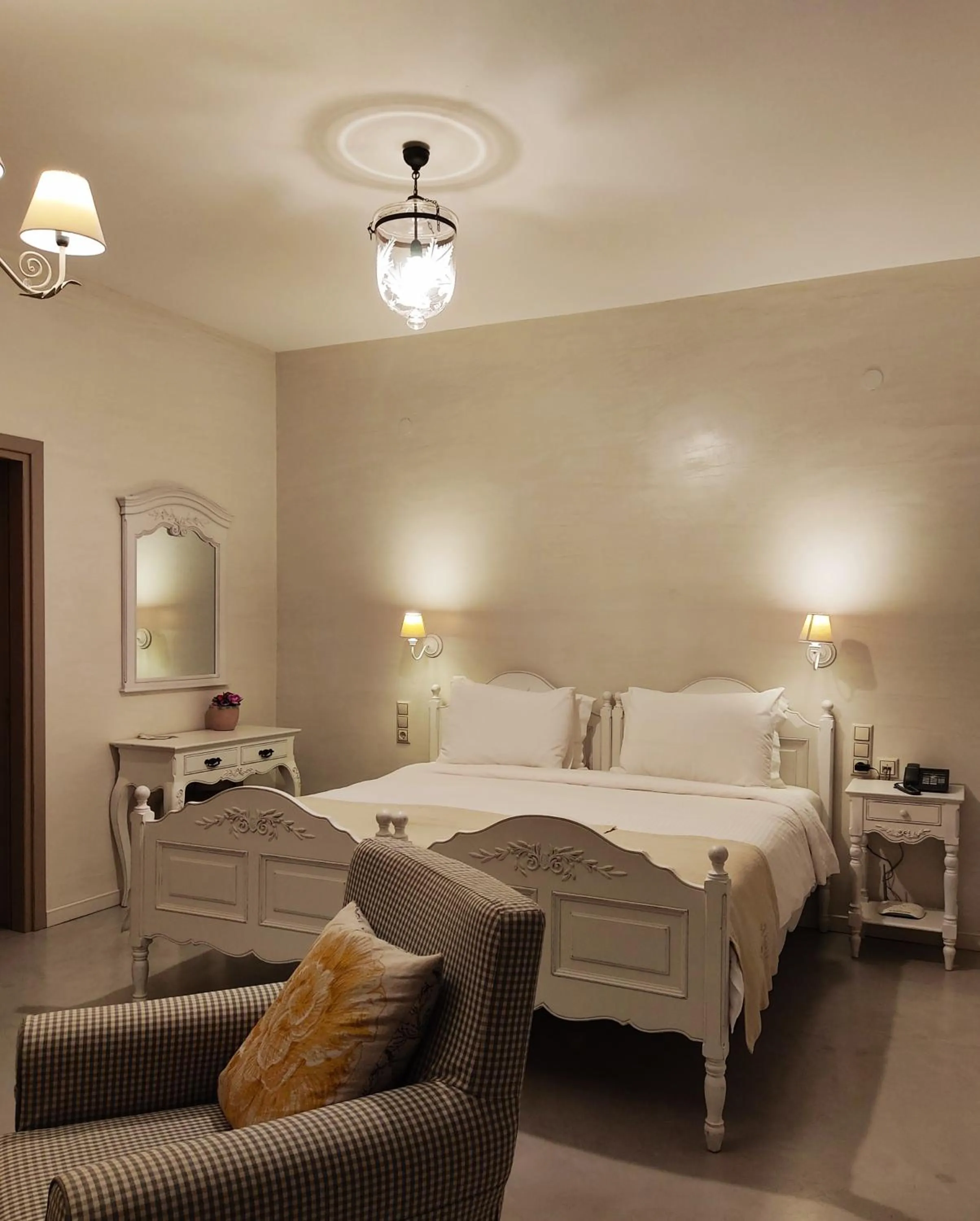 Bed in Haones Suites