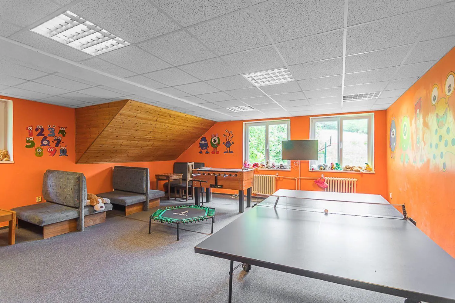 Communal lounge/ TV room in Penzion Vápenka