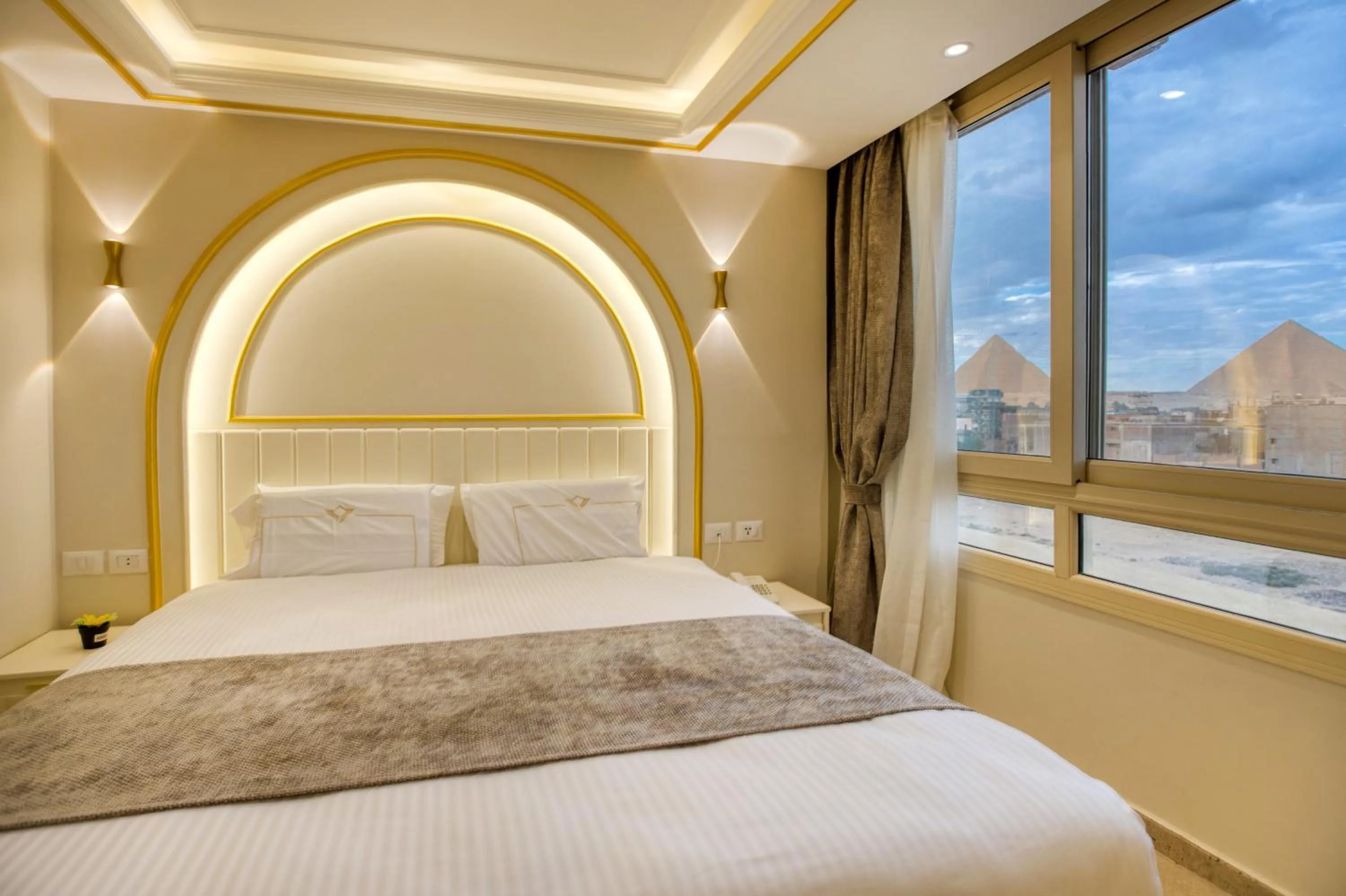 View (from property/room), Bed in Pyramids Plateau Hotel