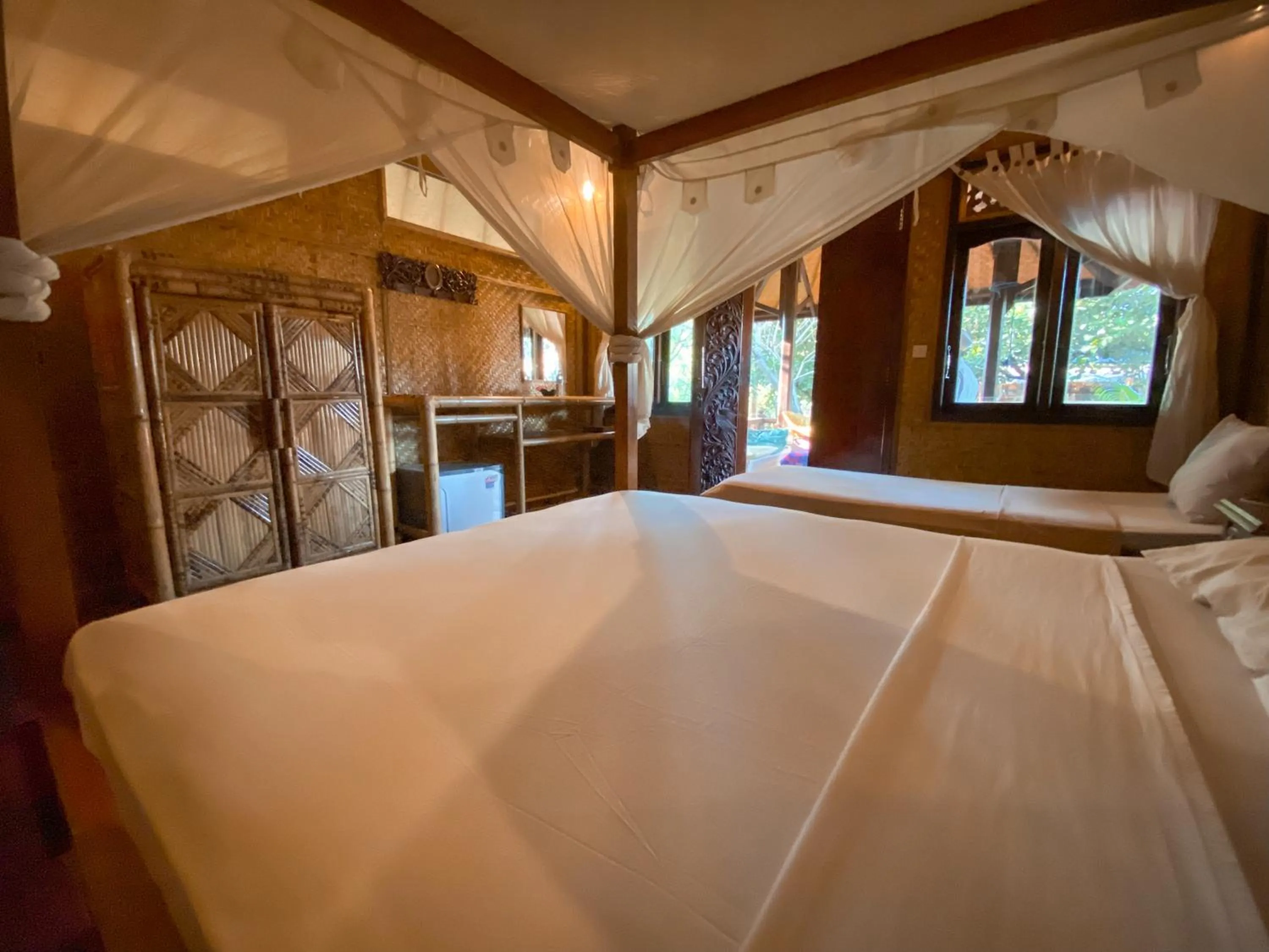 Bed in Sejuk Cottages