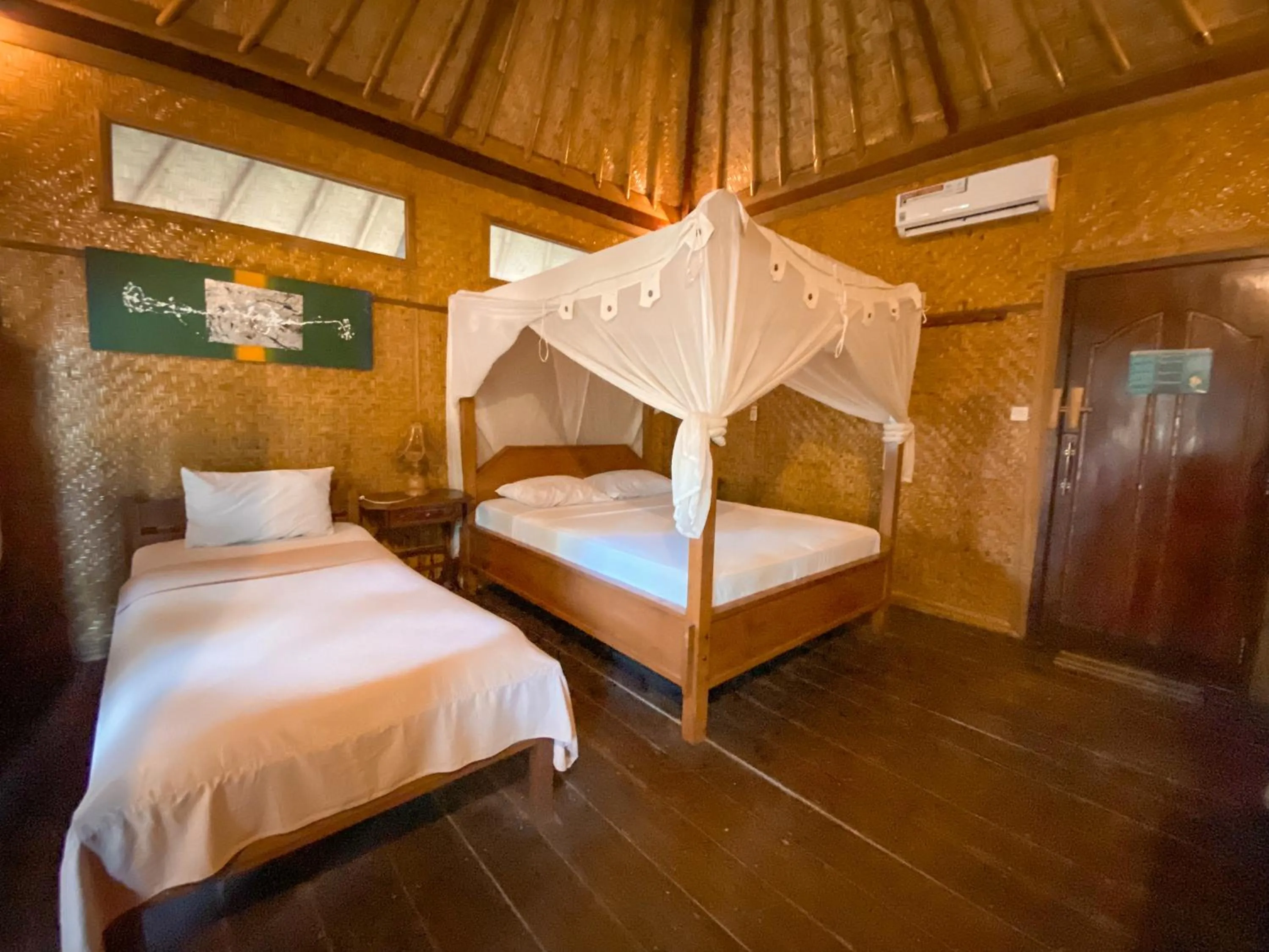 Bed in Sejuk Cottages