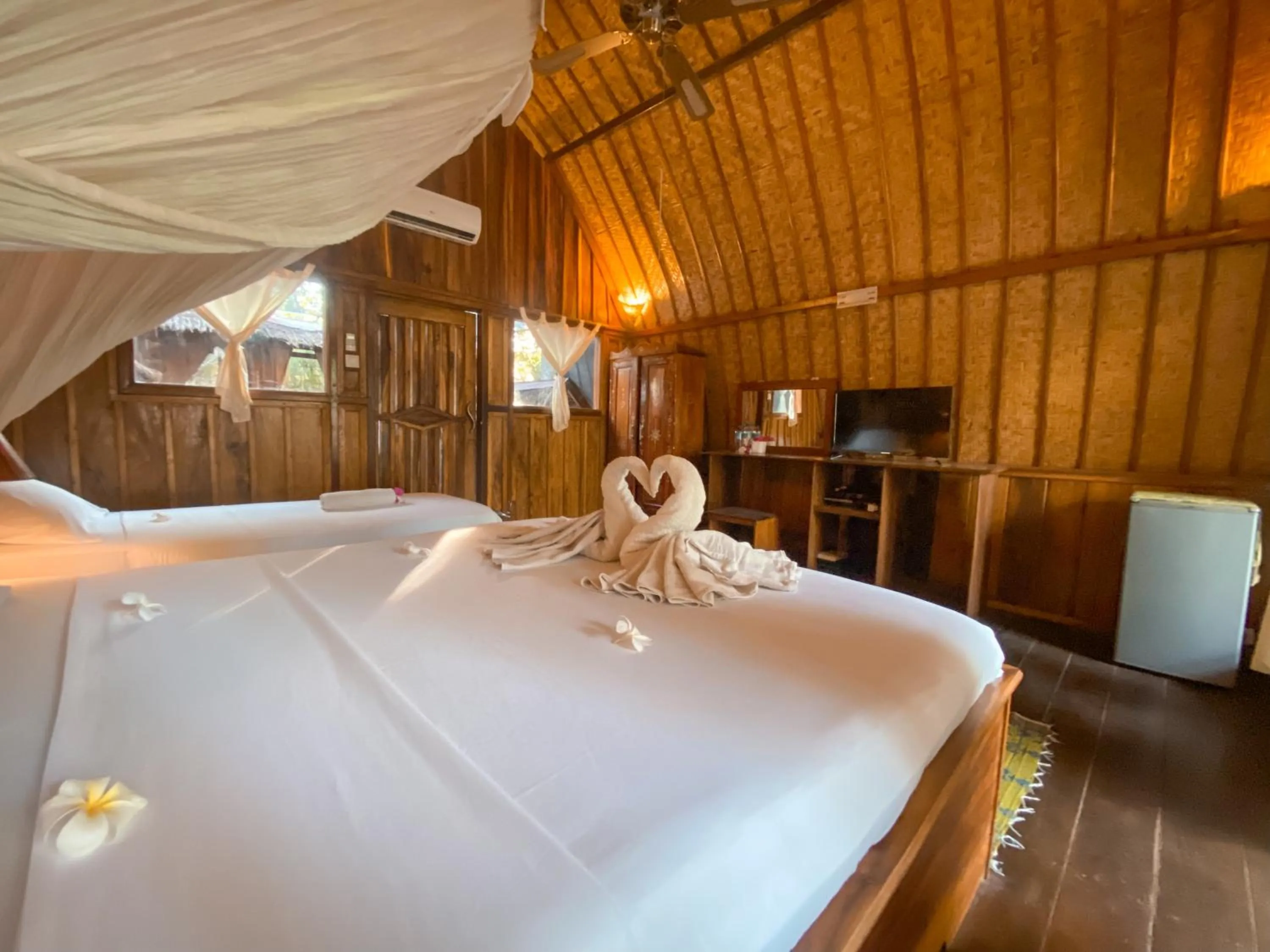 Bed in Sejuk Cottages